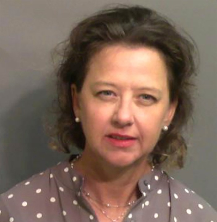 FILE - This jail booking photo provided by Glynn County Sheriff's Office, shows Jackie Johnson, the former district attorney for Georgia's Brunswick Judicial Circuit, after she turned herself in to the Glynn County jail in Brunswick, Ga, Sept. 8, 2021. (Glynn County Sheriff's Office via AP, File)