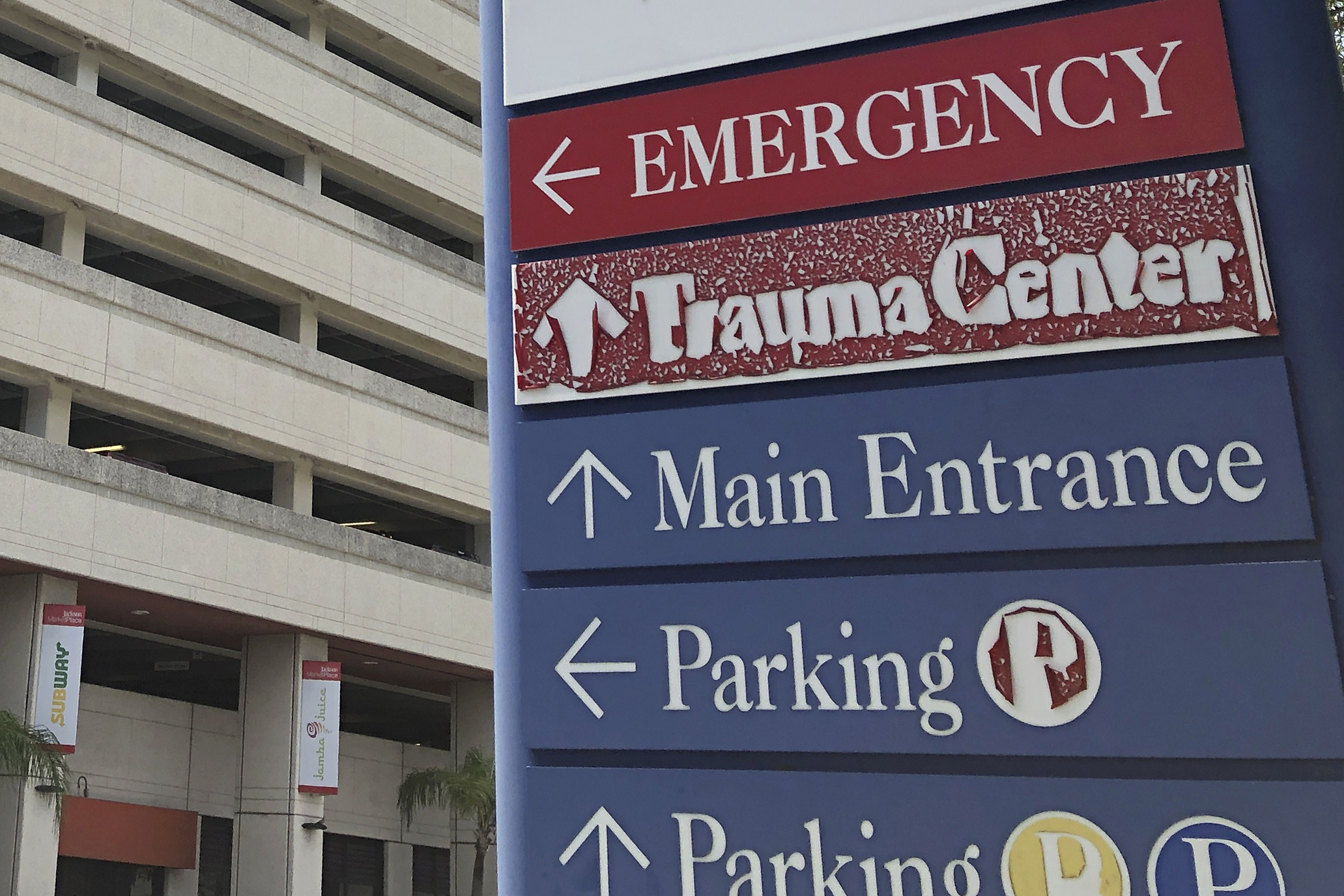 FILE - A sign is displayed outside a hospital in Miami, on July 9, 2020. (AP Photo/Wilfredo Lee, File)