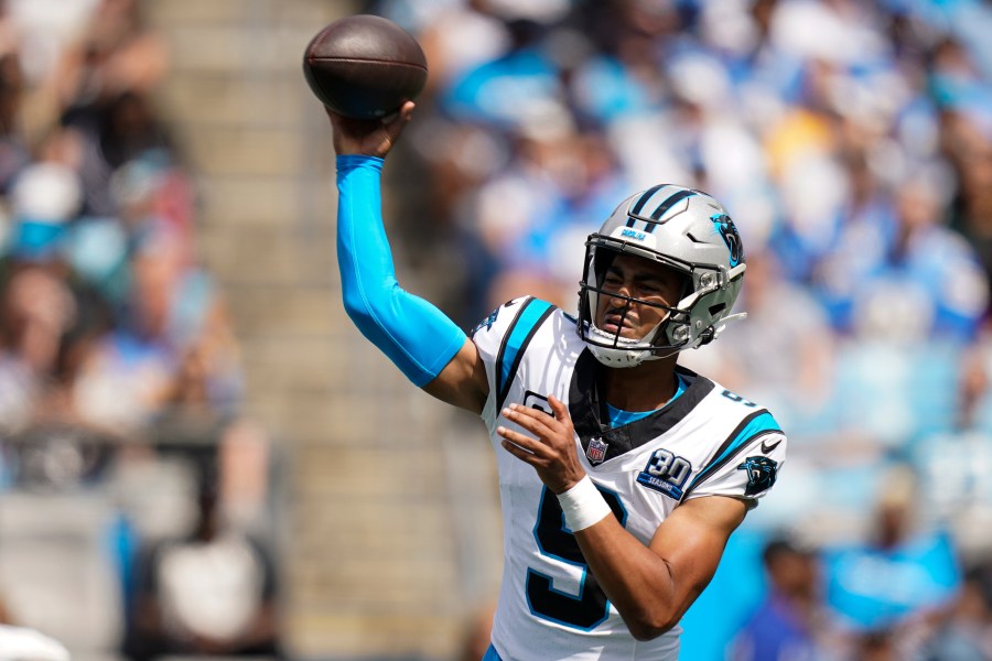 Carolina Panthers quarterback Bryce Young passes against the Los Angeles Chargers during the first half of an NFL football game on Sunday, Sept. 15, 2024, in Charlotte, N.C. (AP Photo/Erik Verduzco)