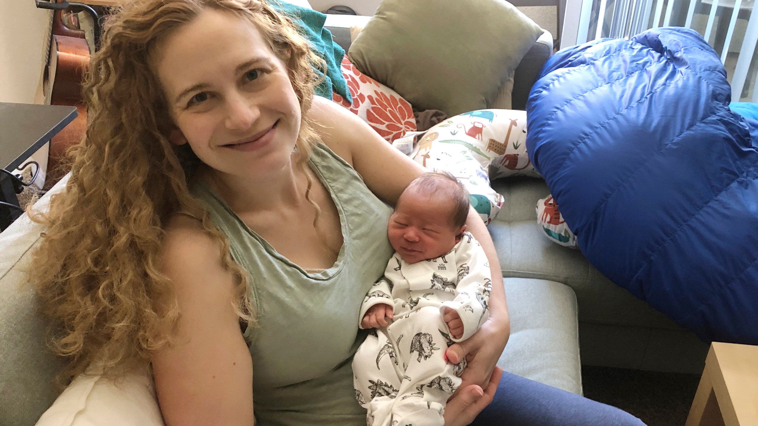 In this photo provided by Liz Chrastil, a neuroscientist with the University of California, Irvine, she her holds her newborn son in May 2020. (Courtesy Liz Chrastil via AP)