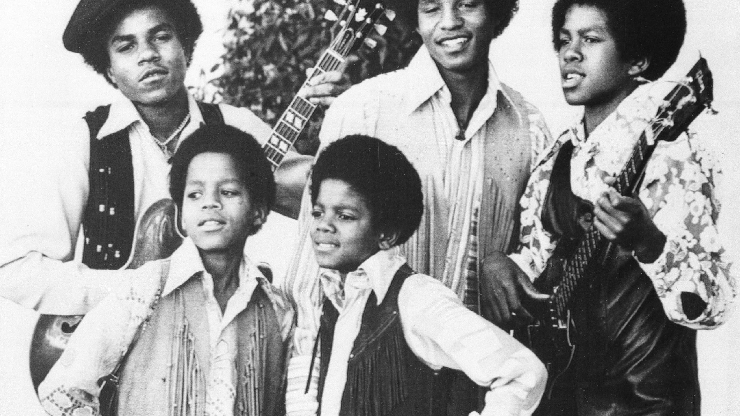 FILE - The Jackson 5, Michael Jackson, front right; Marlon Jackson, front left; Tito Jackson, back left; Jackie Jackson, back center; and Jermaine Jackson, back right; pose for this undated photo together in Los Angeles. (AP Photo, File)