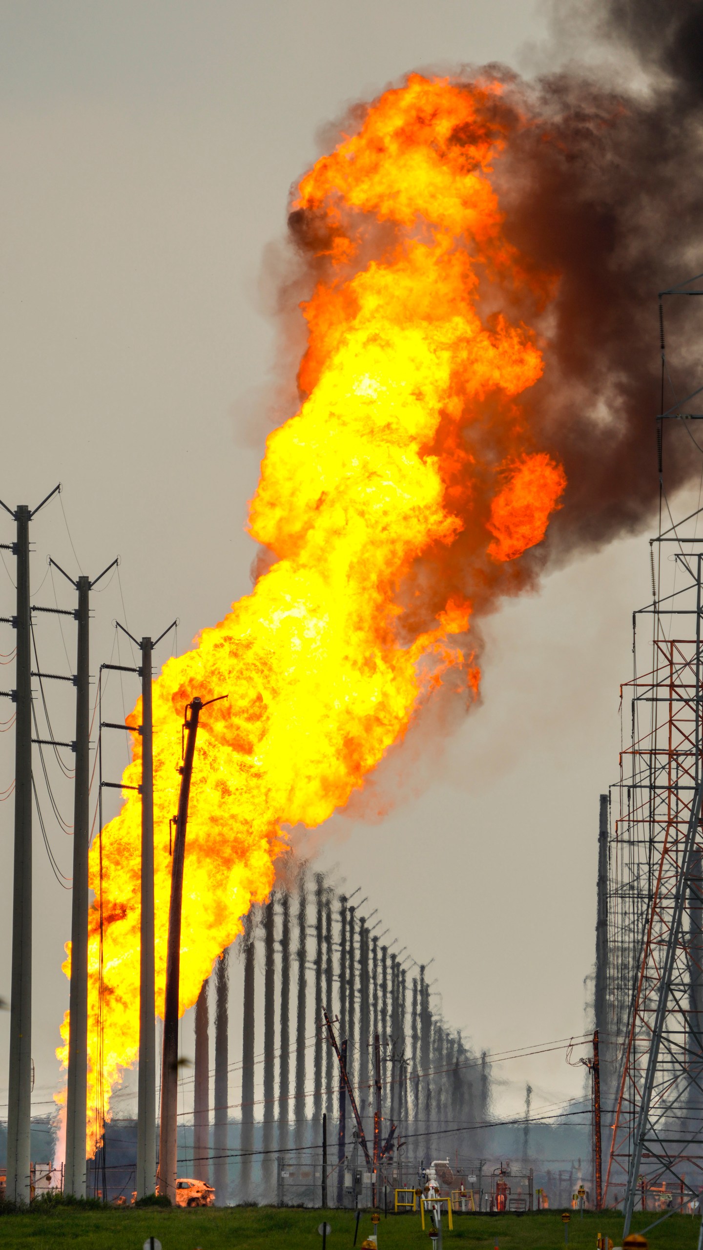 A pipeline carrying liquified natural gas burns near Spencer Highway and Summerton on Monday, Sept. 16, 2024, in La Porte, Texas. (Brett Coomer/Houston Chronicle via AP)