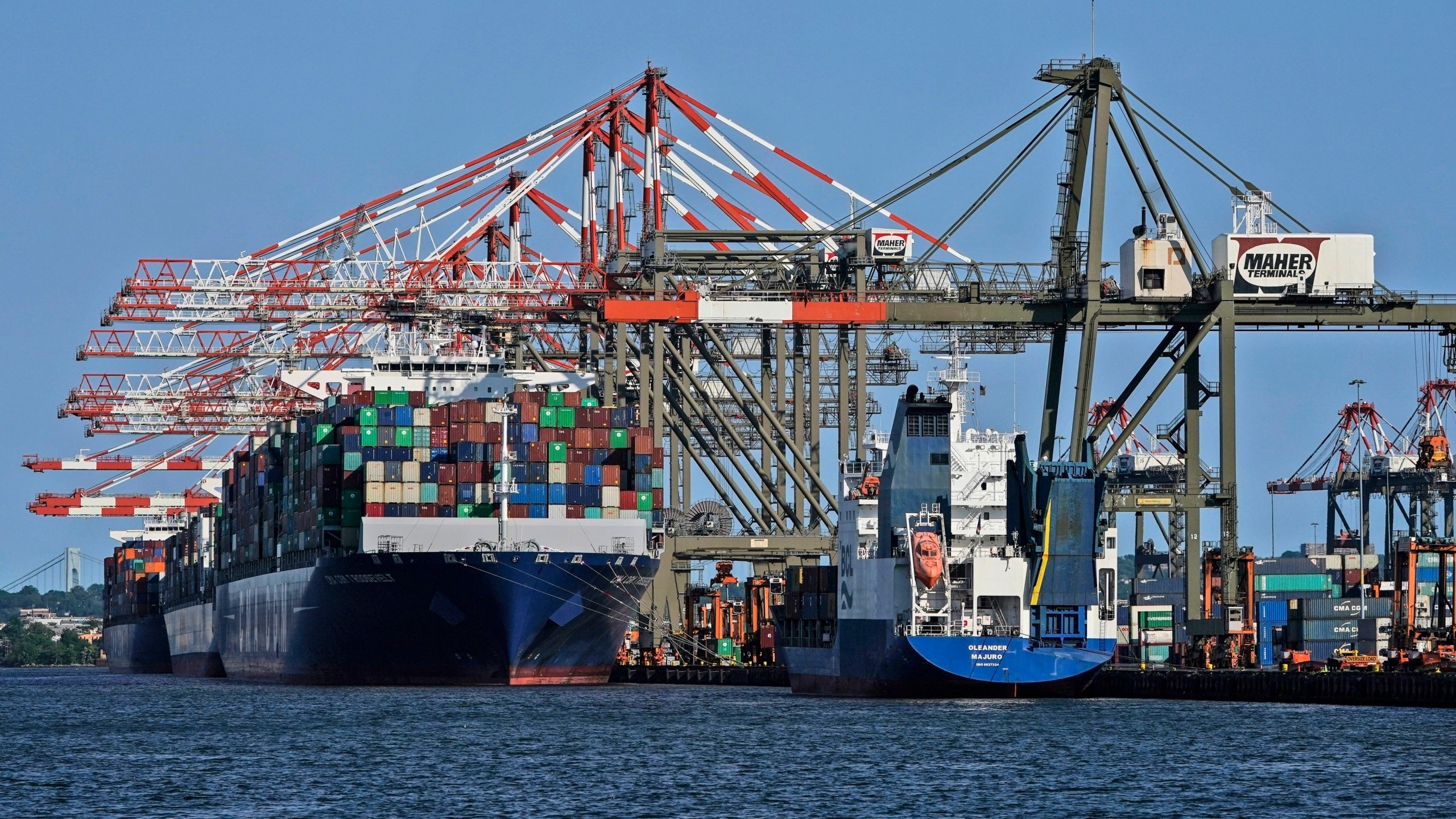 FILE - Container ships are docked at the Port of New York and New Jersey in Elizabeth, N.J., on May 20, 2021. (AP Photo/Seth Wenig, File)