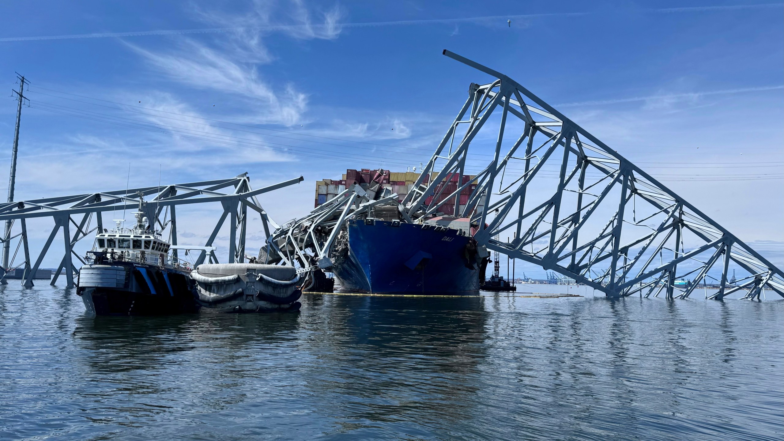 The fallen Francis Scott Key Bridge in Baltimore is pictured Sunday, March 31, 2024, where divers assisted crews with the complicated and meticulous operation of removing steel and concrete. (AP Photos/Mike Pesoli, File)