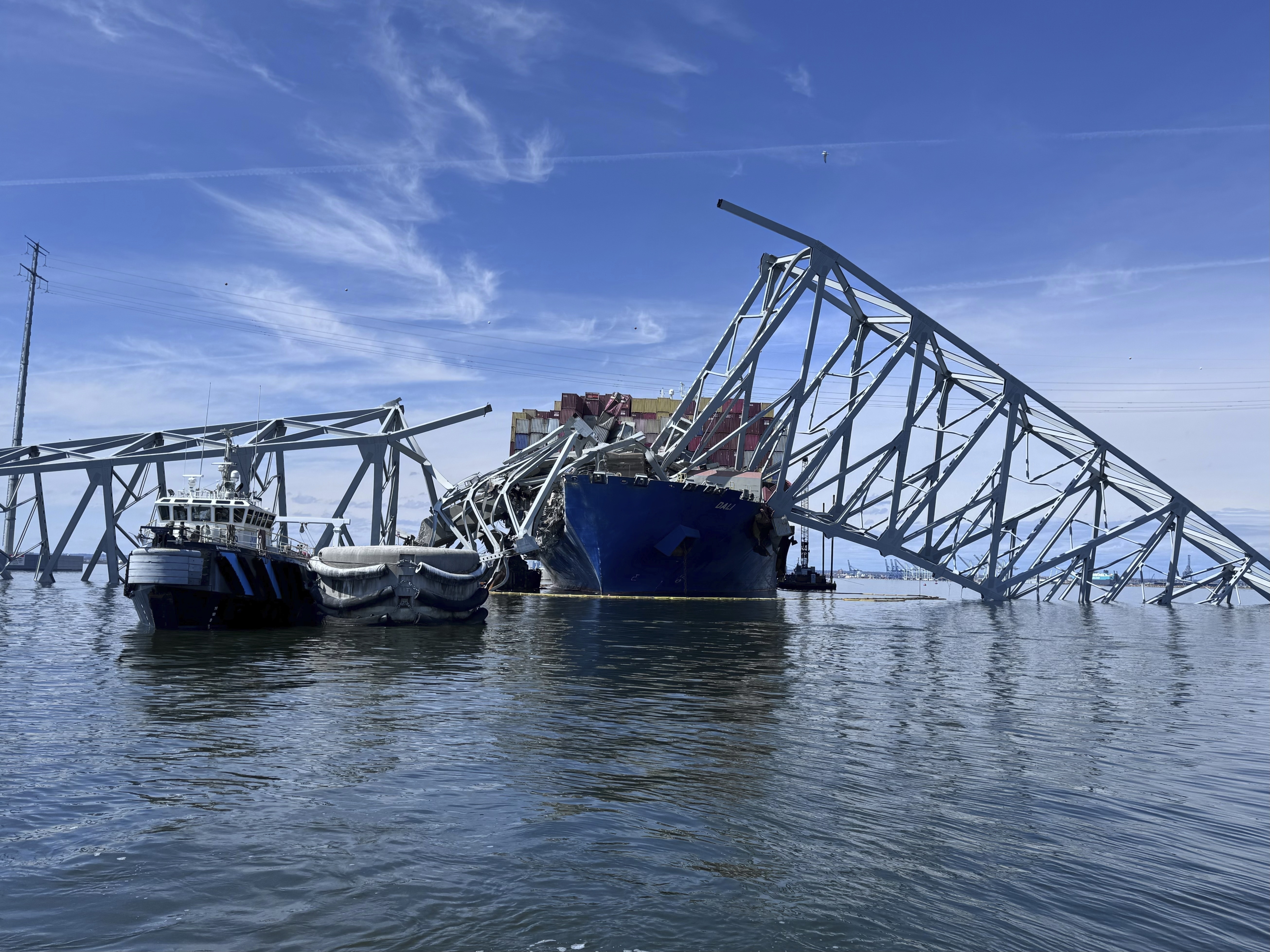 The fallen Francis Scott Key Bridge in Baltimore is pictured Sunday, March 31, 2024, where divers assisted crews with the complicated and meticulous operation of removing steel and concrete. (AP Photos/Mike Pesoli, File)