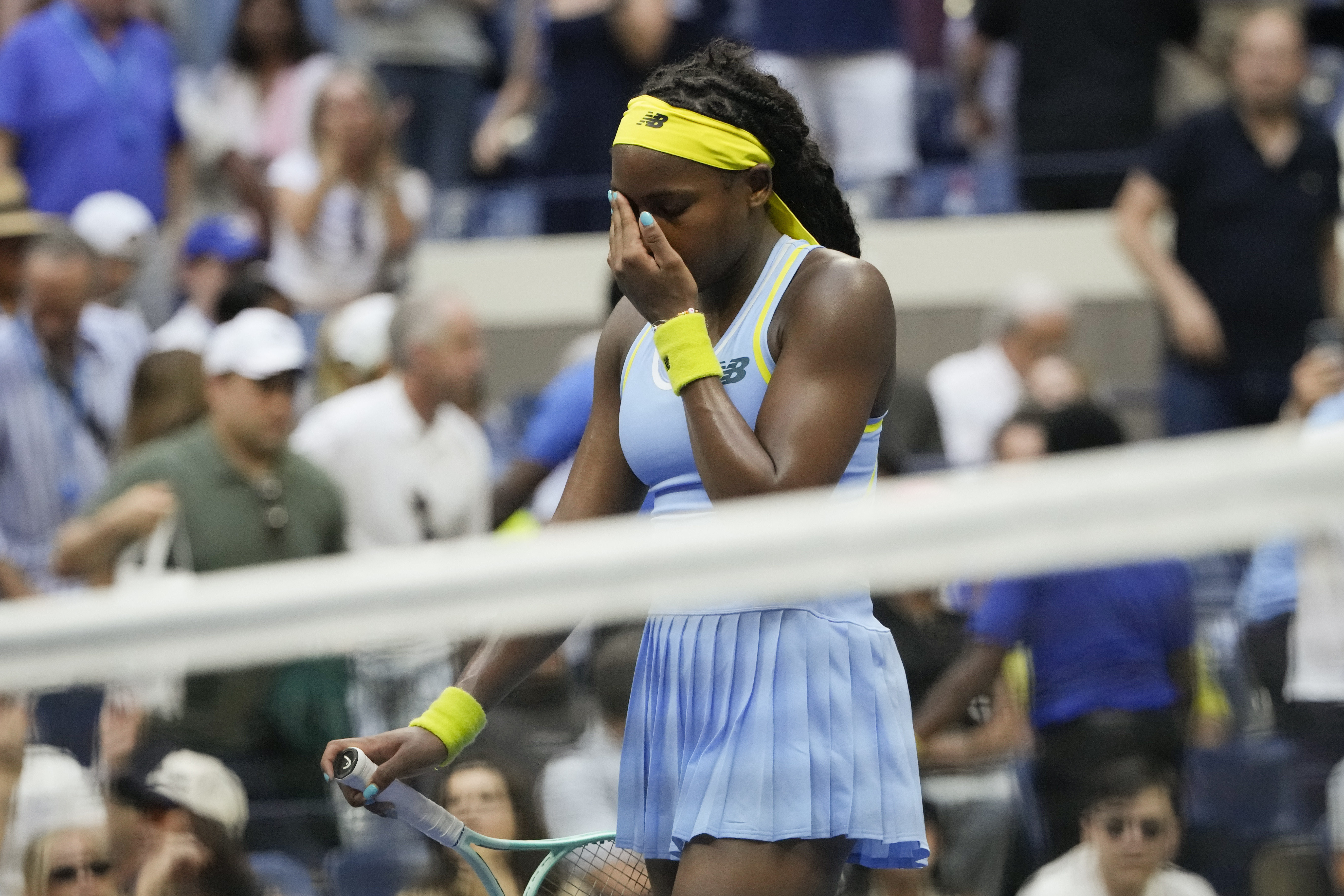 Coco Gauff, of the United States, reacts after losing to Emma Navarro, of the United States, during the fourth round of the U.S. Open tennis championships, Sunday, Sept. 1, in New York. 2024. (AP Photo/Pamela Smith)