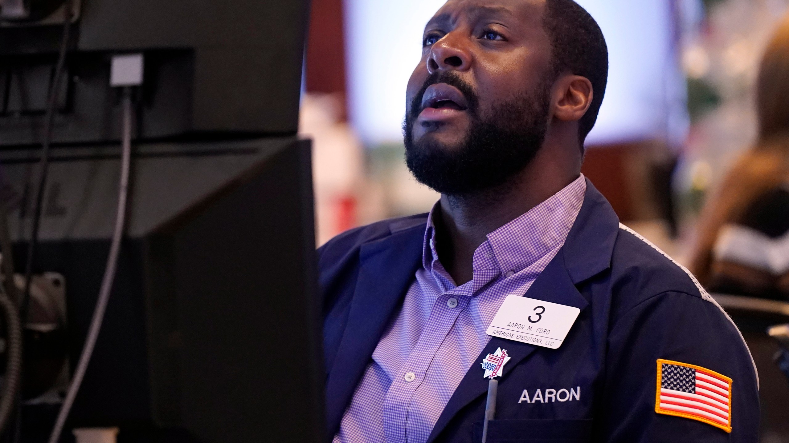 Trader Aaron Ford works on the floor of the New York Stock Exchange, Wednesday, Sept. 18, 2024. (AP Photo/Richard Drew)