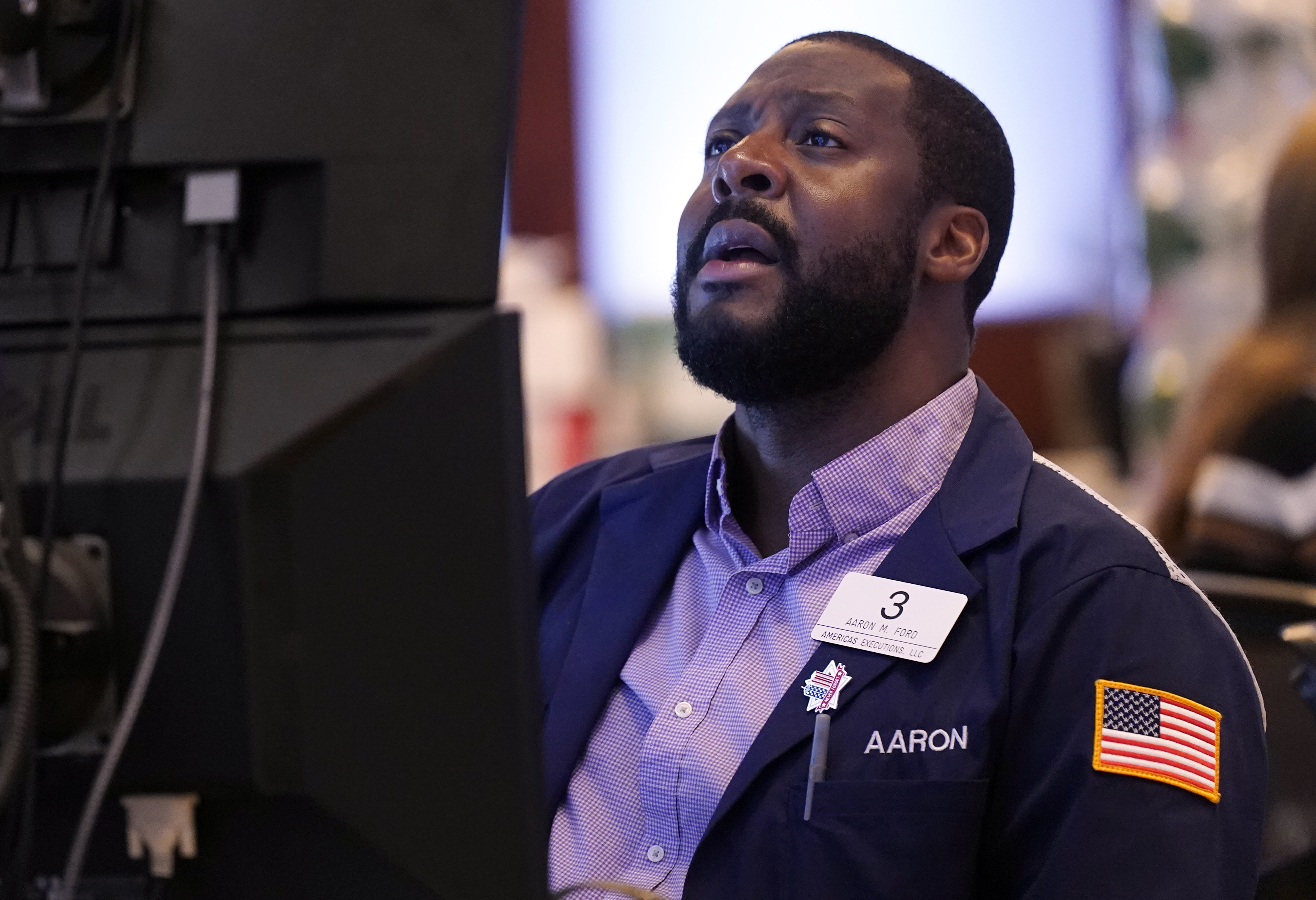 Trader Aaron Ford works on the floor of the New York Stock Exchange, Wednesday, Sept. 18, 2024. (AP Photo/Richard Drew)