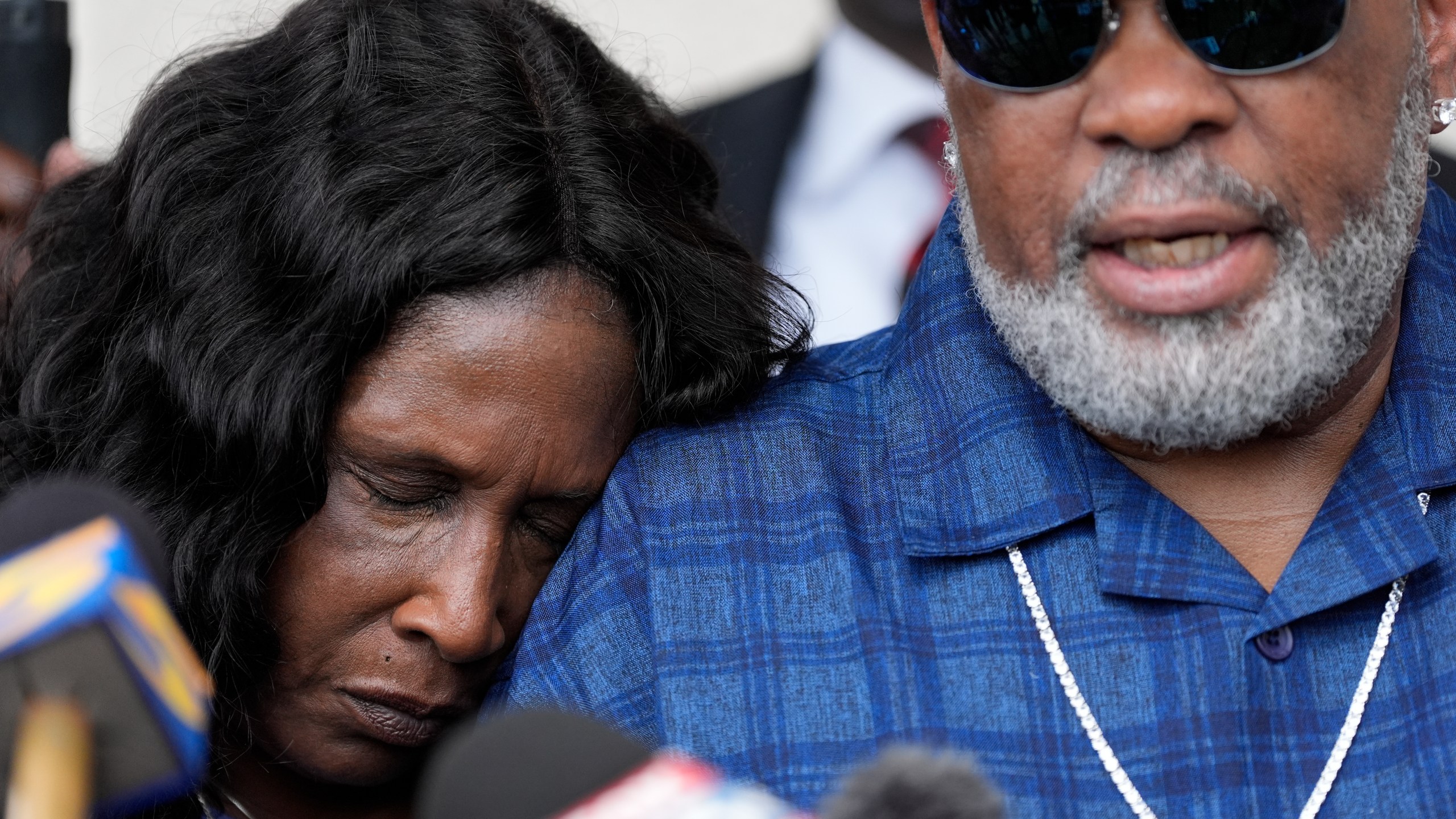 FILE - RowVaughn Wells rests on her husband's shoulder Rodney Wells, the parents of Tyre Nichols, during a news conference after a former Memphis Police Department officer pleaded guilty to civil rights violations in the 2023 fatal beating of their son, Aug. 23, 2024, in Memphis, Tenn. (AP Photo/George Walker IV, File)