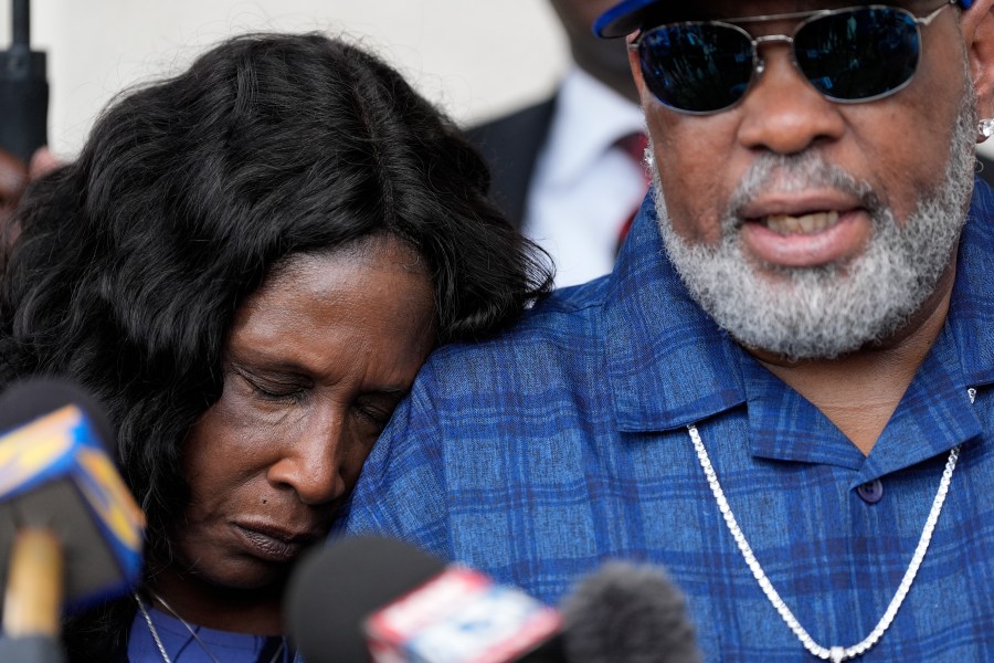 FILE - RowVaughn Wells rests on her husband's shoulder Rodney Wells, the parents of Tyre Nichols, during a news conference after a former Memphis Police Department officer pleaded guilty to civil rights violations in the 2023 fatal beating of their son, Aug. 23, 2024, in Memphis, Tenn. (AP Photo/George Walker IV, File)