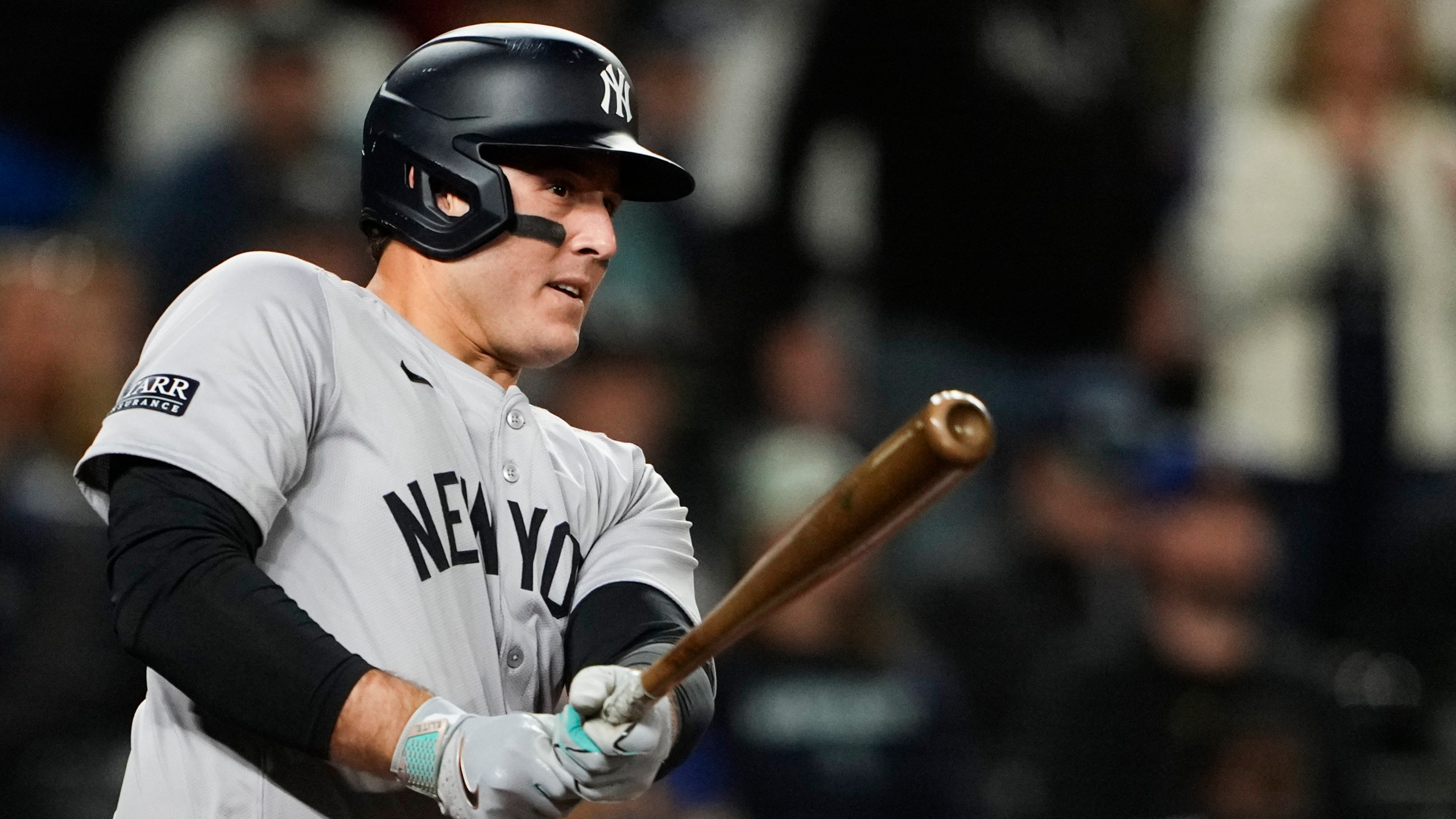 New York Yankees' Anthony Rizzo follows through on an RBI double against the Seattle Mariners during the 10th inning of a baseball game Wednesday, Sept. 18, 2024, in Seattle. (AP Photo/Lindsey Wasson)