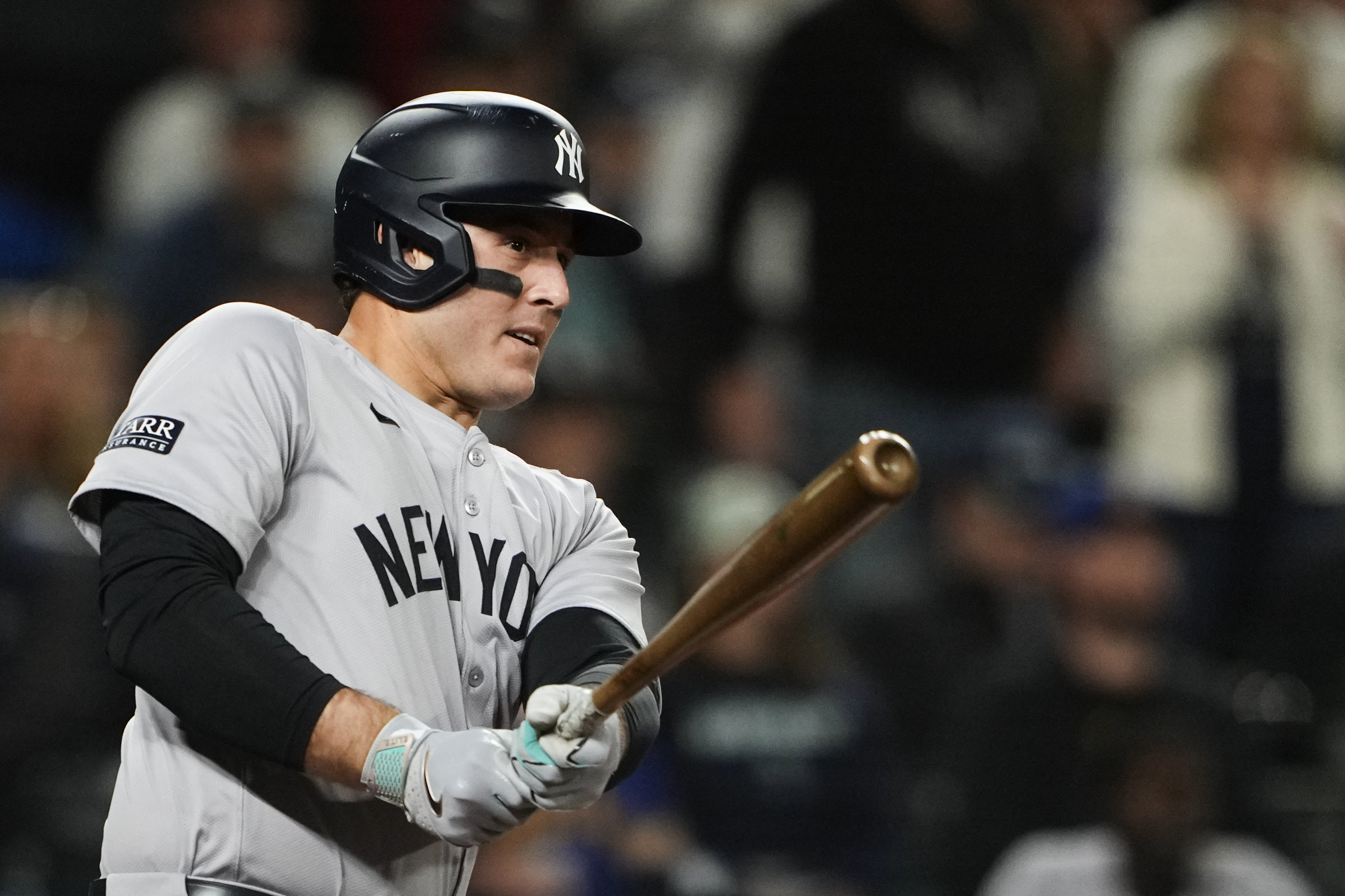 New York Yankees' Anthony Rizzo follows through on an RBI double against the Seattle Mariners during the 10th inning of a baseball game Wednesday, Sept. 18, 2024, in Seattle. (AP Photo/Lindsey Wasson)