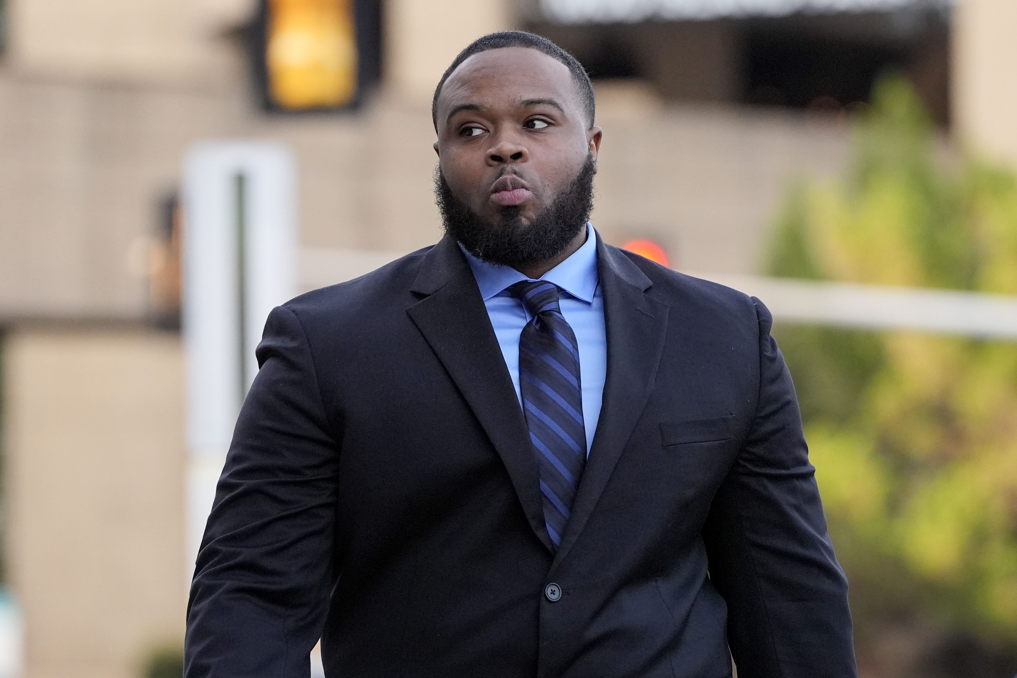 Former Memphis police officer Demetrius Haley arrives at the federal courthouse for the second day of jury selection for the trial in the Tyre Nichols case Tuesday, Sept. 10, 2024, in Memphis, Tenn. (AP Photo/George Walker IV)