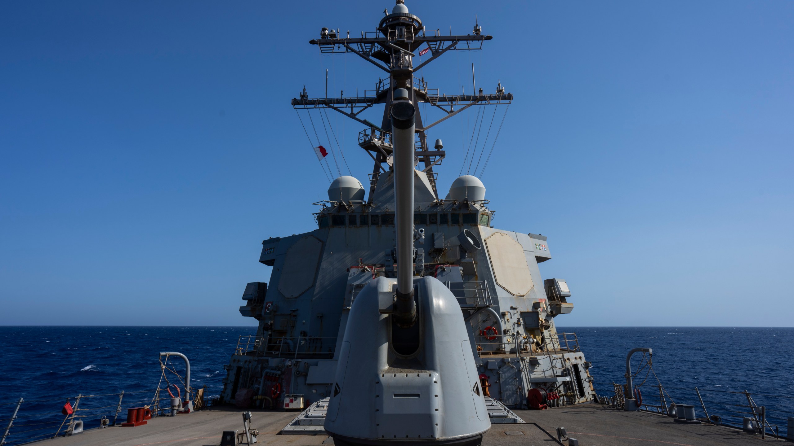 FILE - The Arleigh Burke-class guided missile destroyer USS Laboon sails in the Red Sea, June 12, 2024. (AP Photo/Bernat Armangue, File)