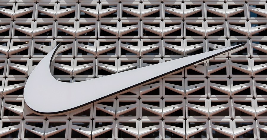 File - The Nike logo is shown on a store in Miami Beach, Fla. on Aug. 8, 2017. (AP Photo/Alan Diaz, File)