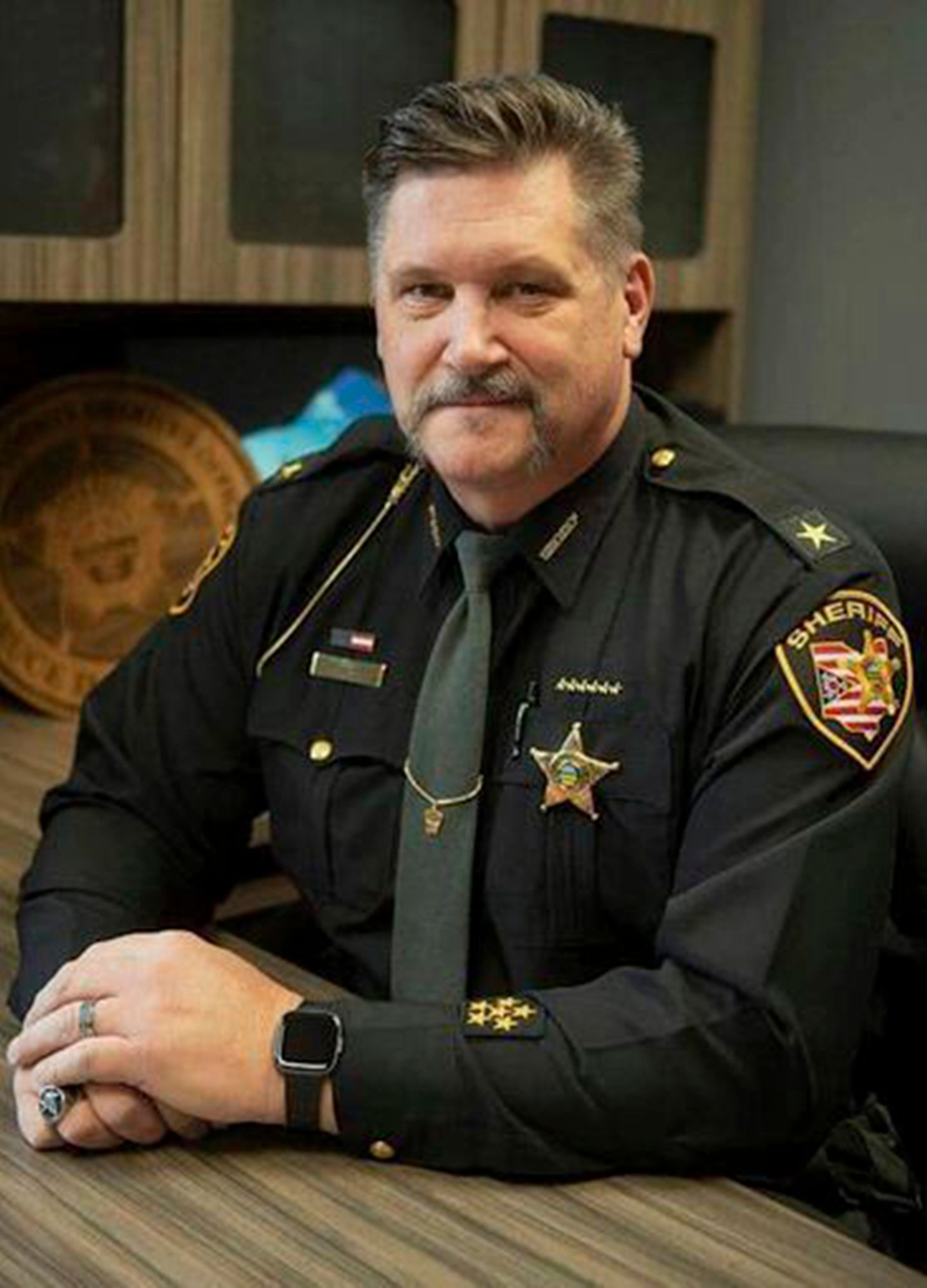 In this undated photo released by the Portage County Sheriff's Office, Sheriff Bruce D. Zuchowski poses. Zuchowski, is under fire for a social media post in which he said people with Kamala Harris yard signs should have their addresses recorded so that immigrants can be sent to live with them if Harris wins. (Portage County Sheriff's Office via AP)