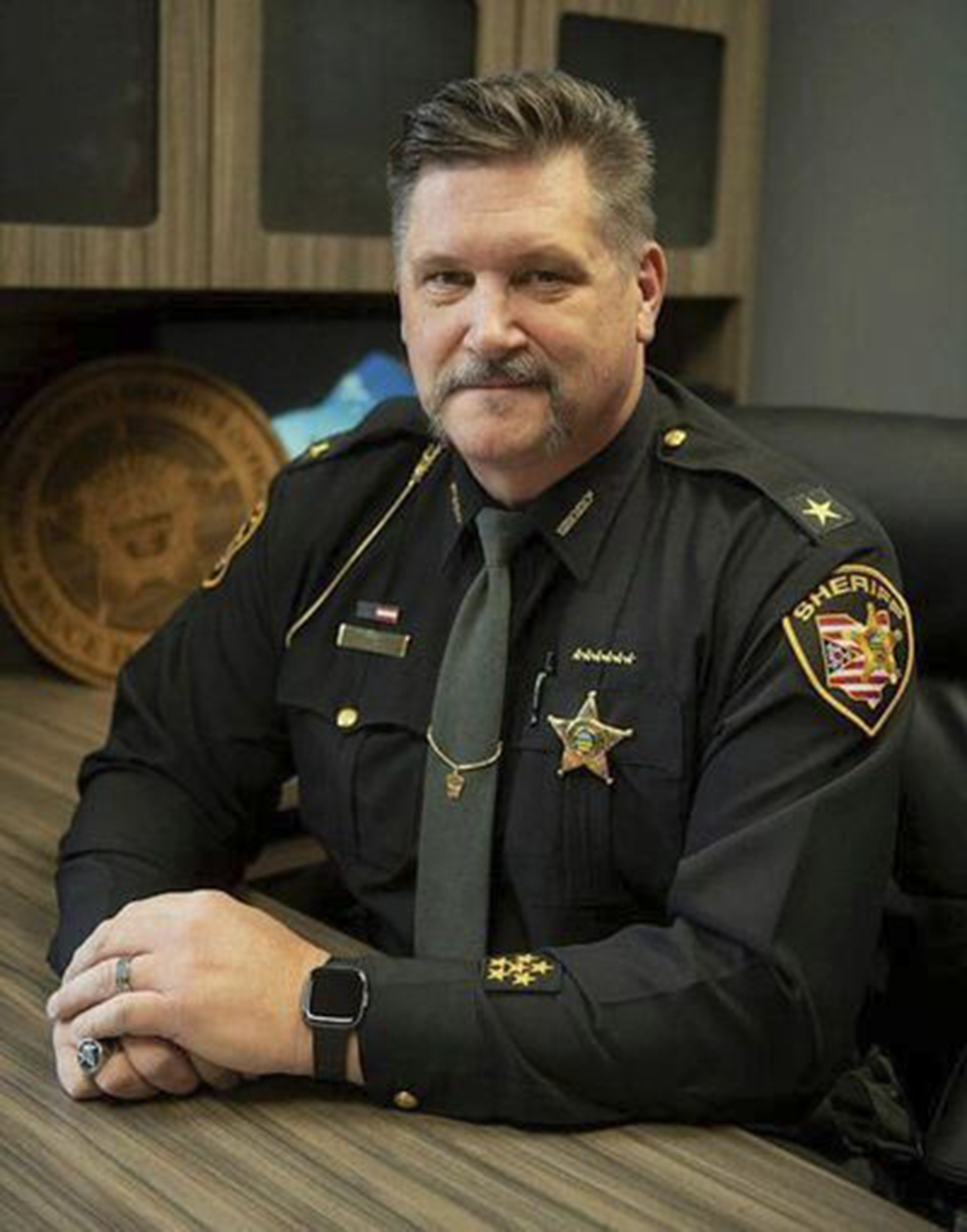 In this undated photo released by the Portage County Sheriff's Office, Sheriff Bruce D. Zuchowski poses. Zuchowski, is under fire for a social media post in which he said people with Kamala Harris yard signs should have their addresses recorded so that immigrants can be sent to live with them if Harris wins. (Portage County Sheriff's Office via AP)