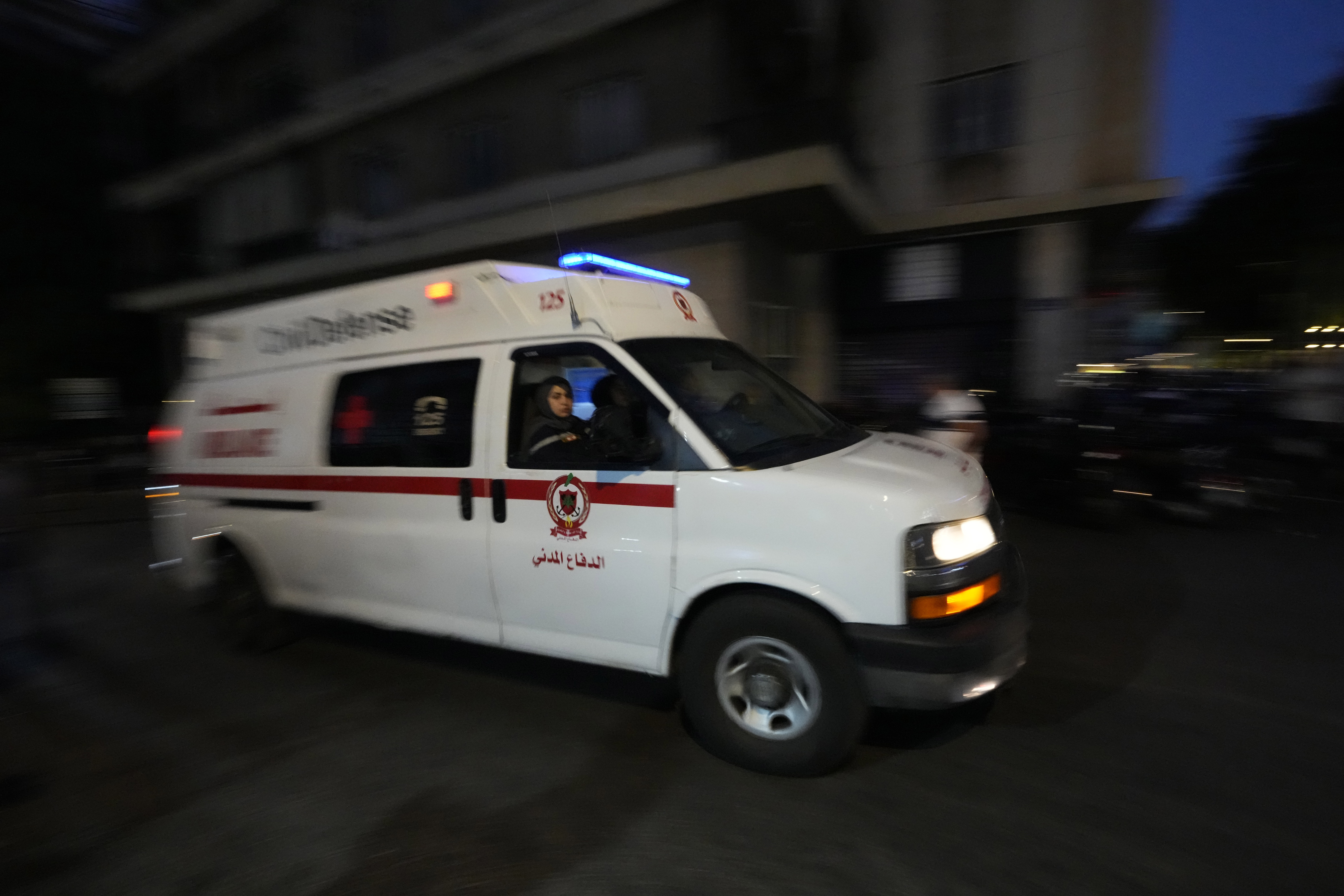 An ambulance carrying wounded people whose handheld pager exploded, arrive at the American University hospital in Beirut, Lebanon, Tuesday, Sept. 17, 2024. (AP Photo/Hassan Ammar)