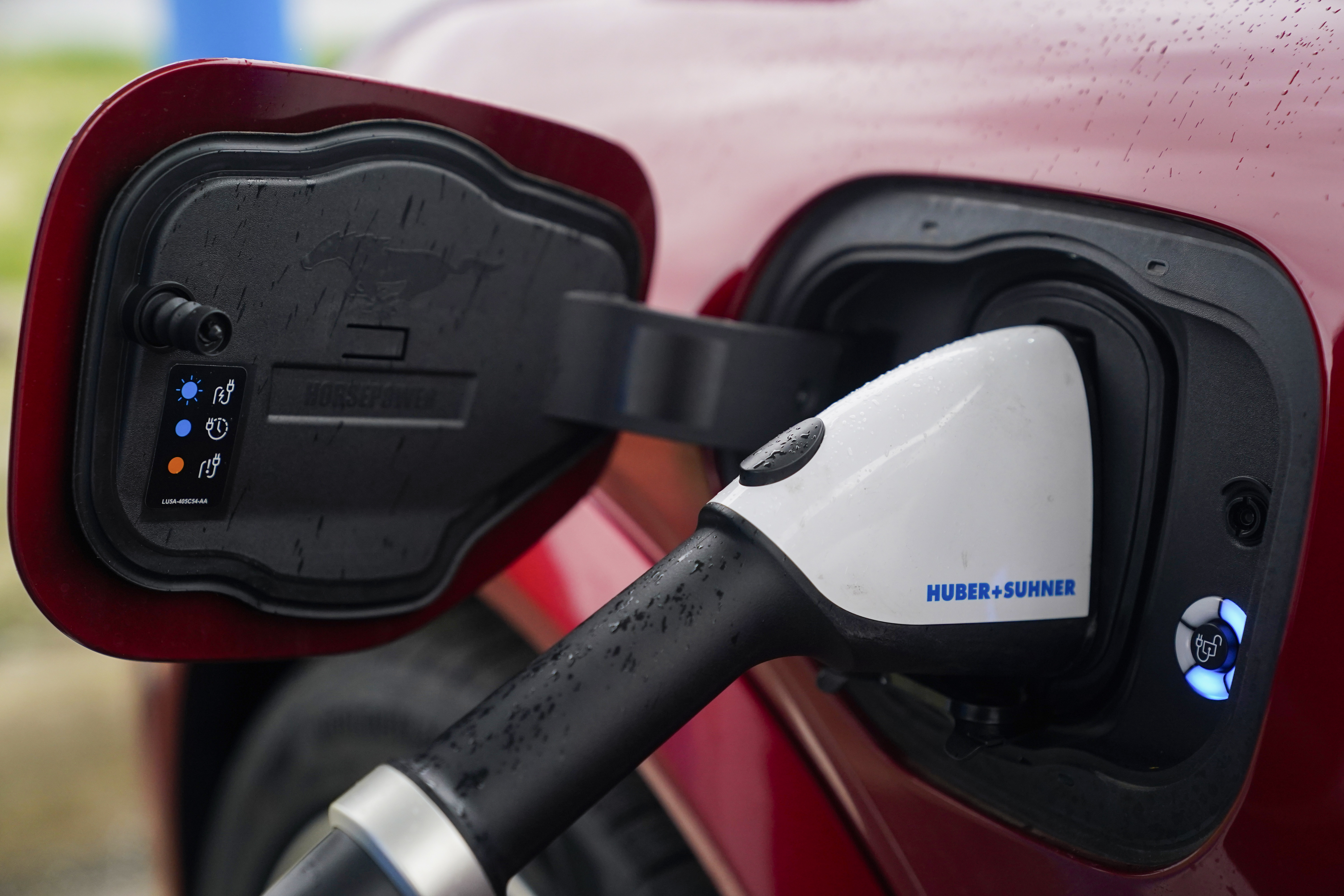 FILE - A 2023 Ford Mustang Mach-E charges, Friday, March 8, 2024, at an electric vehicle charging station in London, Ohio. (AP Photo/Joshua A. Bickel, File)