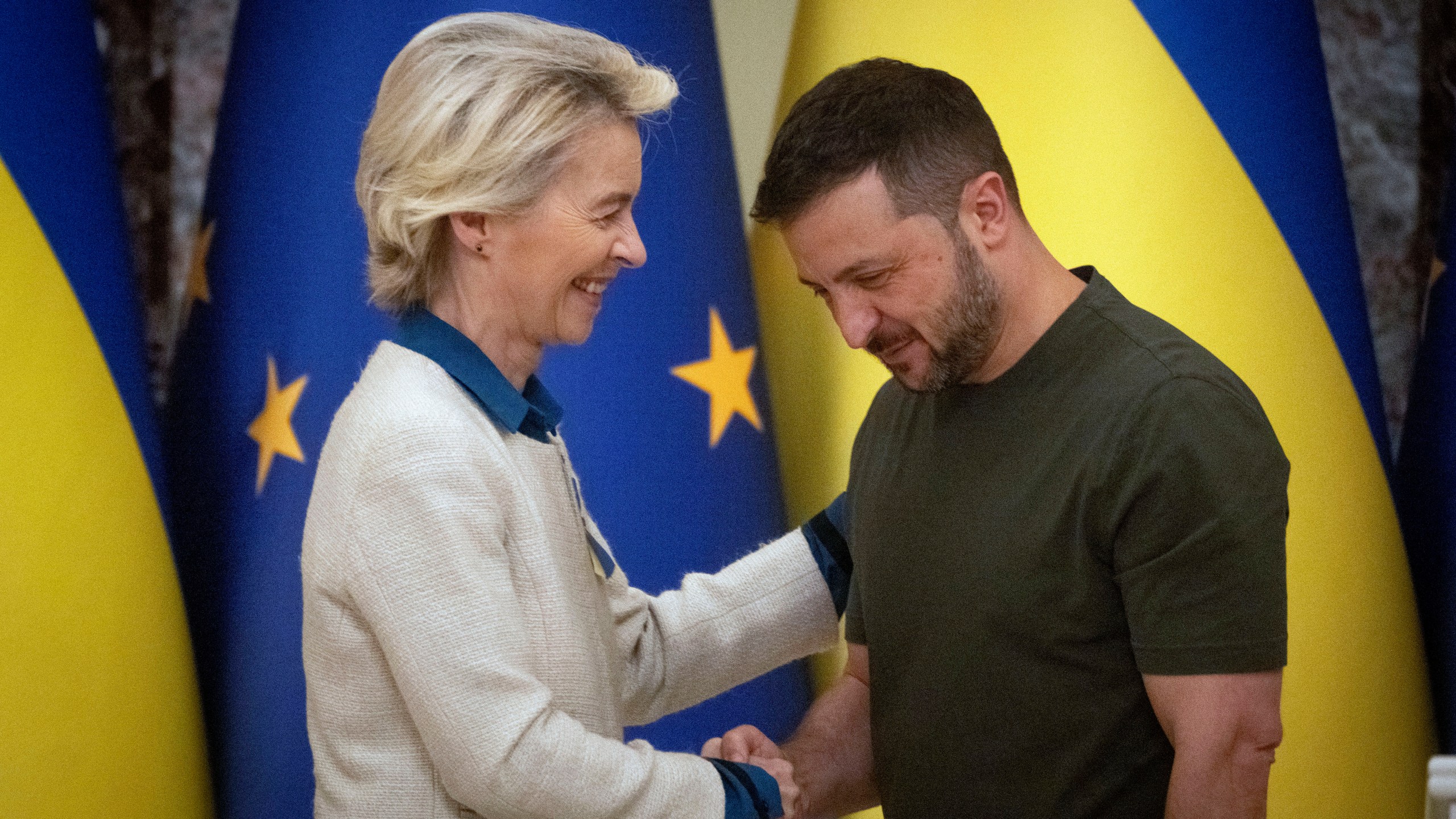 Ukrainian President Volodymyr Zelenskyy, right, and European Commission President Ursula von der Leyen greet each other in Kyiv, Ukraine, Friday, Sept. 20, 2024. (AP Photo/Efrem Lukatsky)