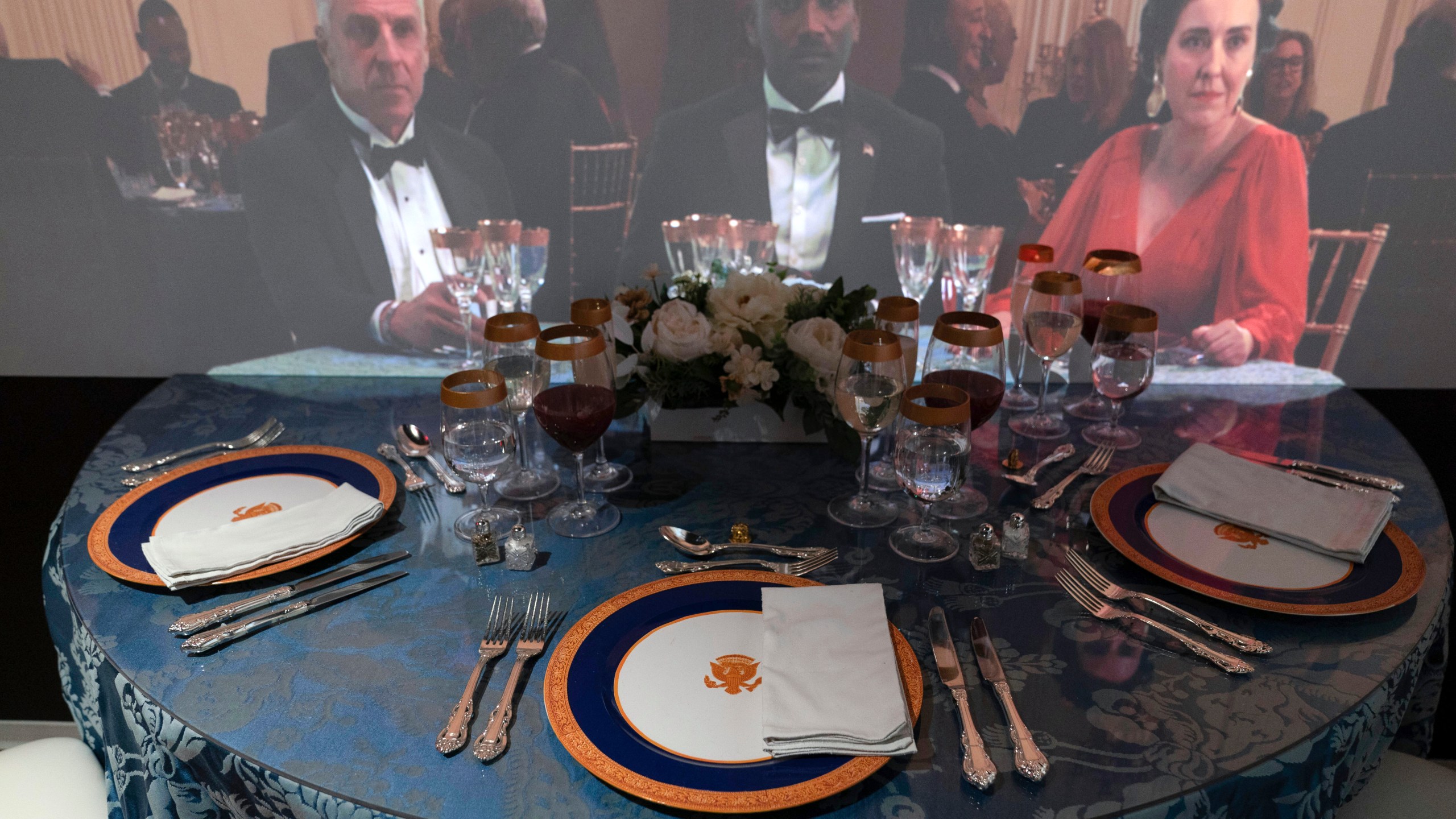 A 3D interactive room with dinner tables, music and videos of State Dinners at the White House, shown at The People's House exhibit, Monday, Sept. 16, 2024 in Washington. (AP Photo/Jose Luis Magana)