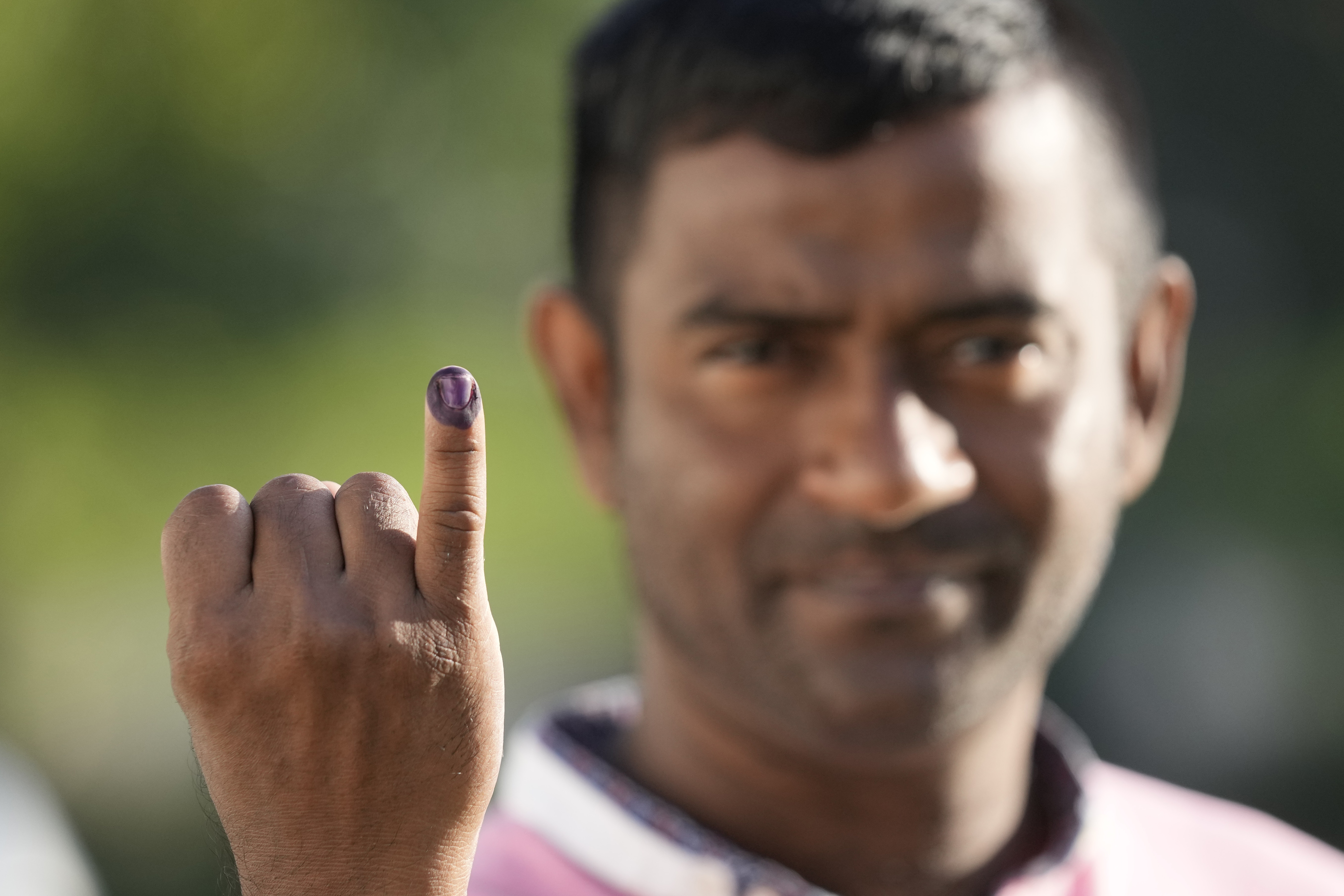 A person shows indelible mark on his finger after casting his vote in Colombo, Sri Lanka, Saturday, Sept. 21, 2024. (AP Photo/Eranga Jayawardane)