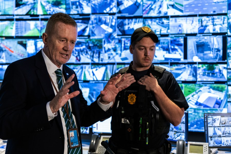 United Nations Department of Safety & Security, Chief Michael Browne, left, speaks to the media during a tour of the UN Security Operations Center inside the United Nations Headquarters, Friday Sept. 20, 2024. (AP Photo/Stefan Jeremiah)