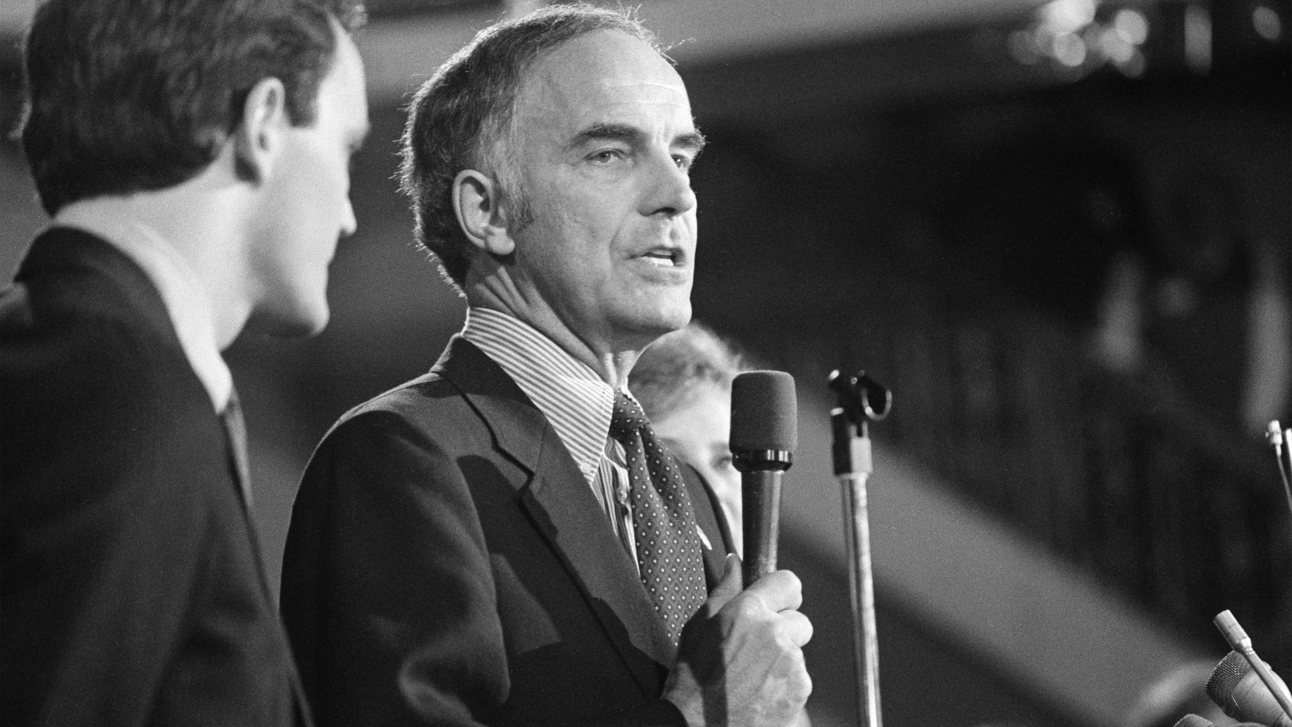 Sen. Dan Evans (R-Wash.) stands with his son Dan Jr., after he won the primary election for the senate seat for Washington State, Oct. 12, 1983. (AP Photo/Barry Sweet, File)