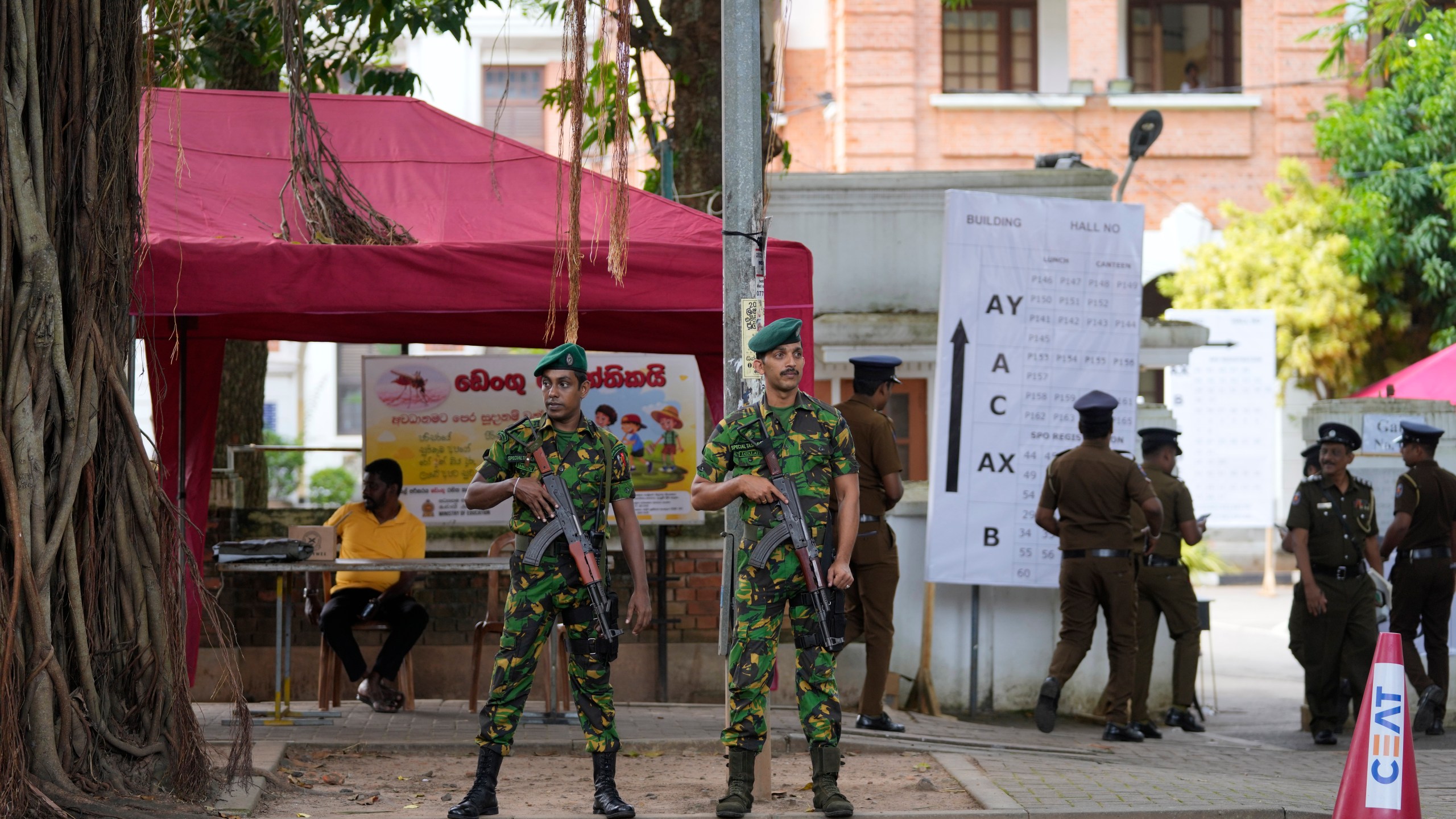 Police commandos stand guard outside a ballot counting center in Colombo, Sri Lanka, Sunday Sept. 22, 2024. (AP Photo/Eranga Jayawardane)