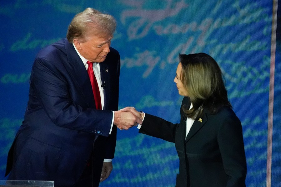 FILE - Republican presidential nominee former President Donald Trump and Democratic presidential nominee Vice President Kamala Harris shake hands before the start of an ABC News presidential debate at the National Constitution Center, Sept. 10, 2024, in Philadelphia. (AP Photo/Alex Brandon, file)