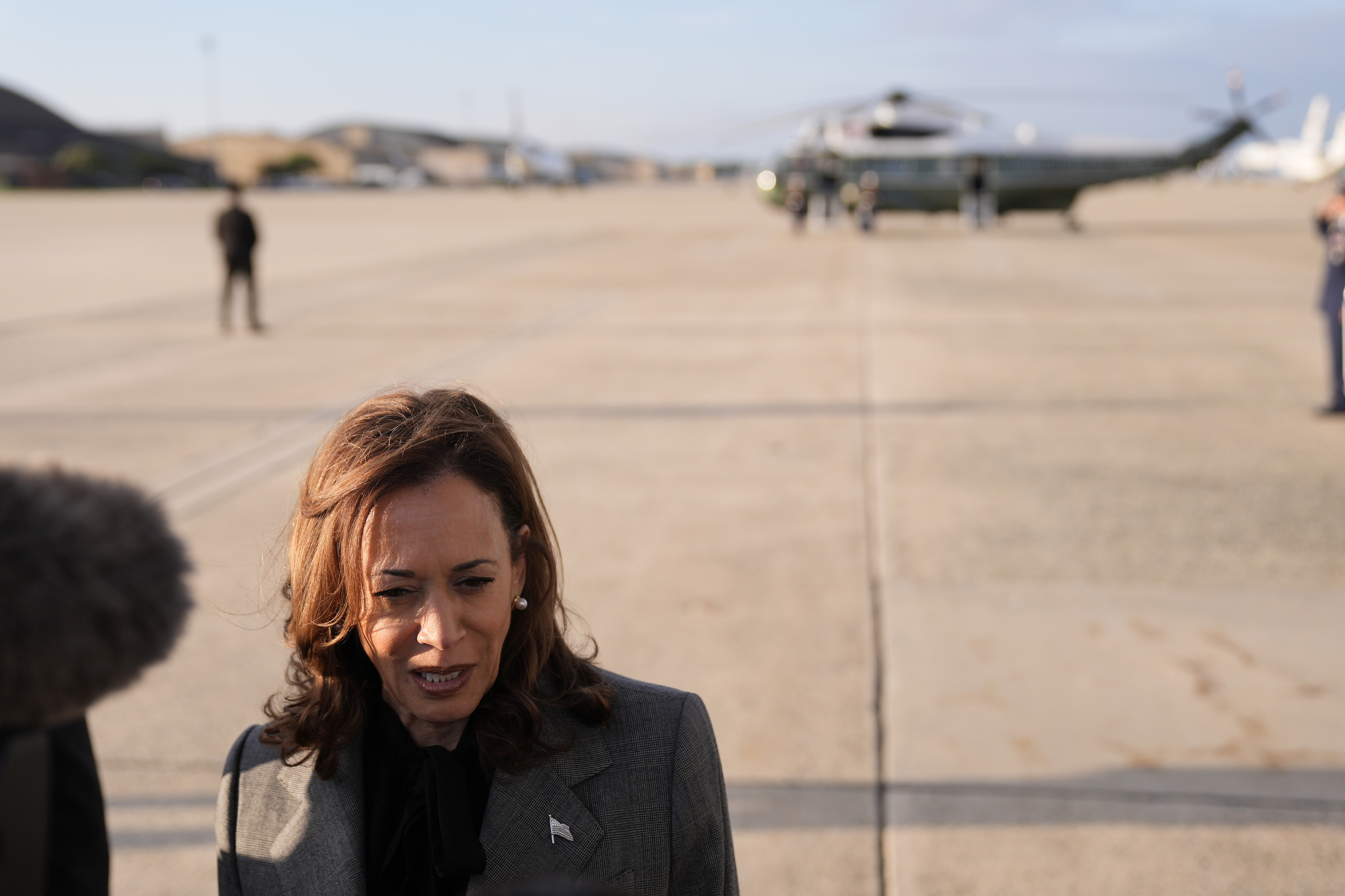 Democratic presidential nominee Vice President Kamala Harris speaks to members of the media upon her arrival at Andrews Air Force Base, Md., Sunday, Sept. 22, 2024. (AP Photo/Matt Rourke/Pool)