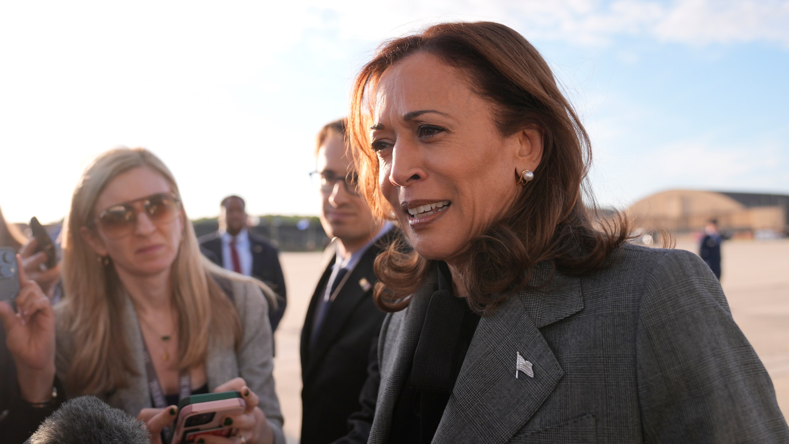 Democratic presidential nominee Vice President Kamala Harris speaks to members of the media upon her arrival at Andrews Air Force Base, Md., Sunday, Sept. 22, 2024. (AP Photo/Matt Rourke/Pool)