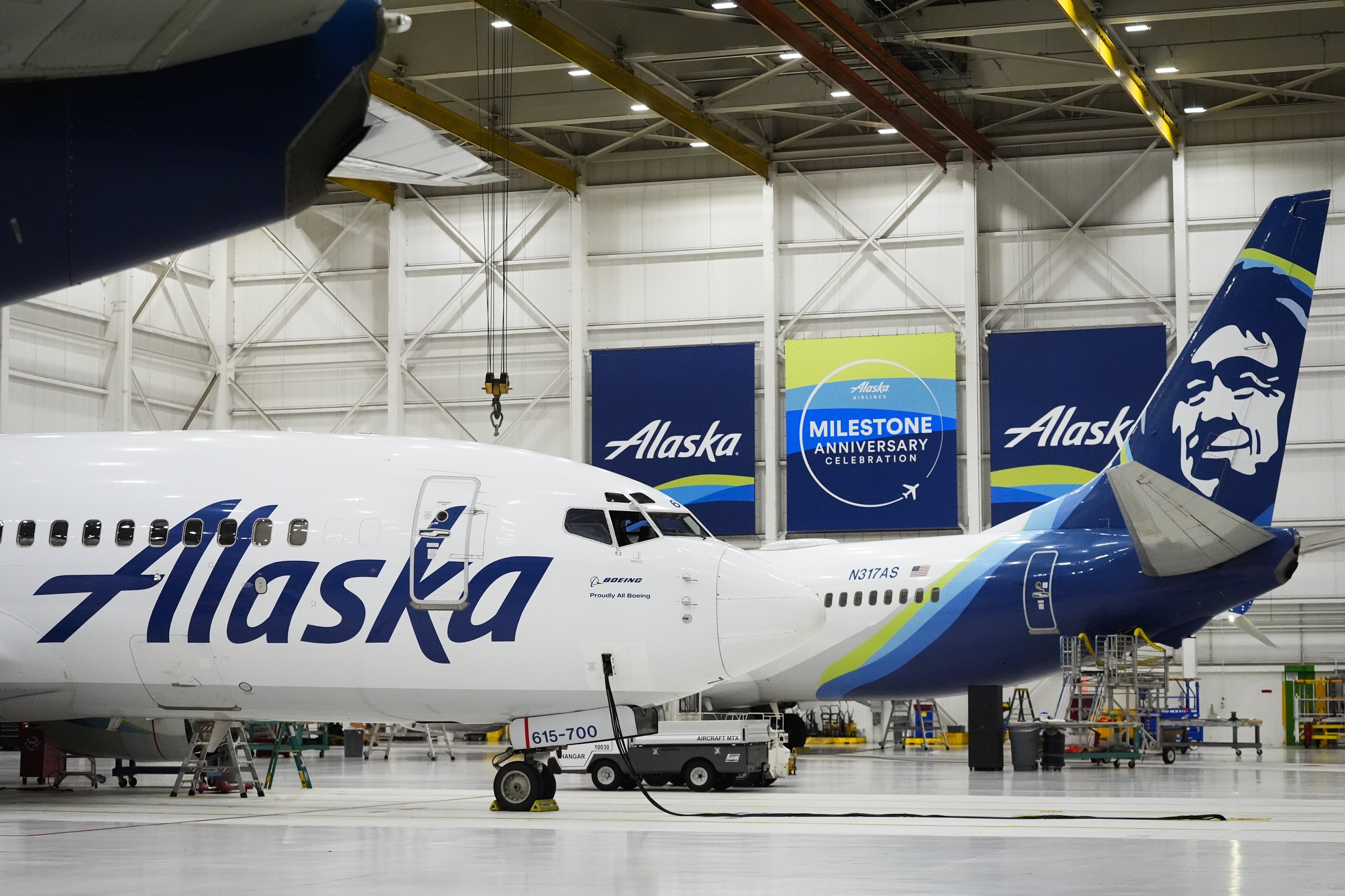 FILE - Alaska Airlines aircraft sits in the airline's hangar at Seattle-Tacoma International Airport Wednesday, Jan. 10, 2024, in SeaTac, Wash. (AP Photo/Lindsey Wasson, File)