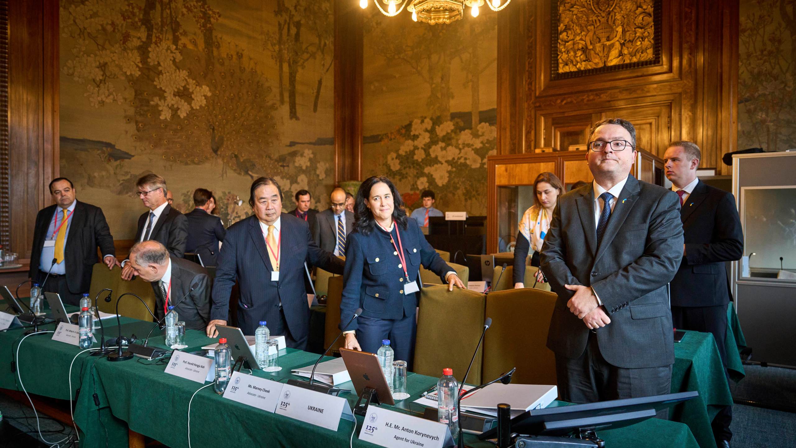 The Ukrainian delegation at the start of PCA Case between Ukraine and the Russian Federation in the Netherlands, Monday, Sept. 23, 2024. (AP Photo/Phil Nijhuis)