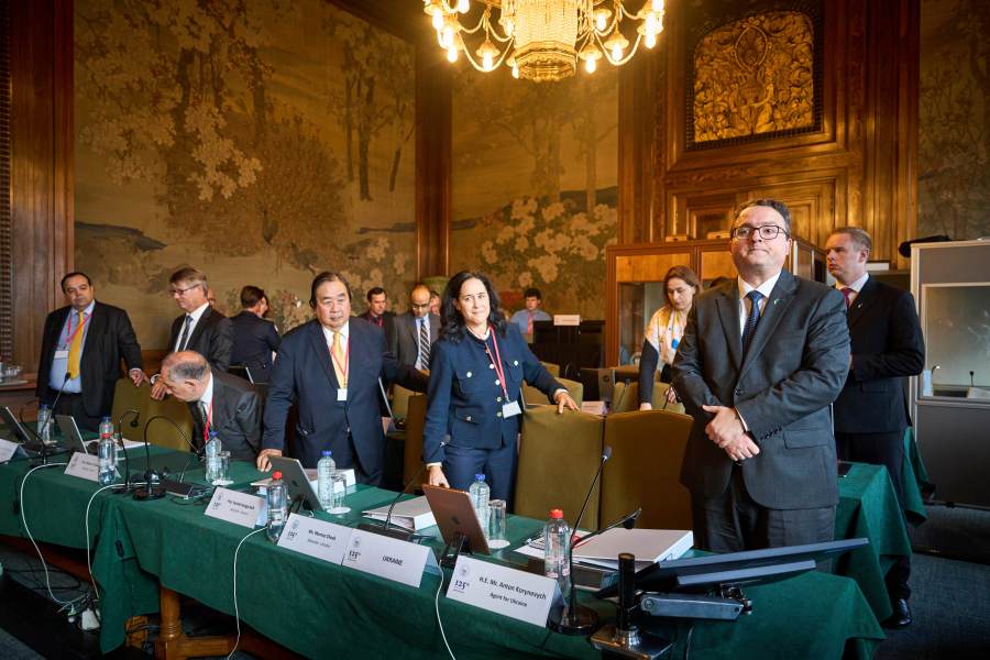 The Ukrainian delegation at the start of PCA Case between Ukraine and the Russian Federation in the Netherlands, Monday, Sept. 23, 2024. (AP Photo/Phil Nijhuis)