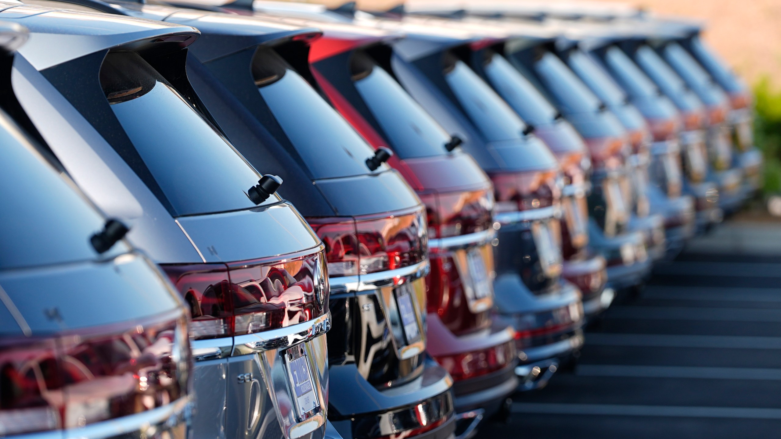 FILE - A row of unsold 2024 Atlas utility vehicles is shown July 28, 2024, at a Volkswagen dealership in Denver. (AP Photo/David Zalubowski, File)