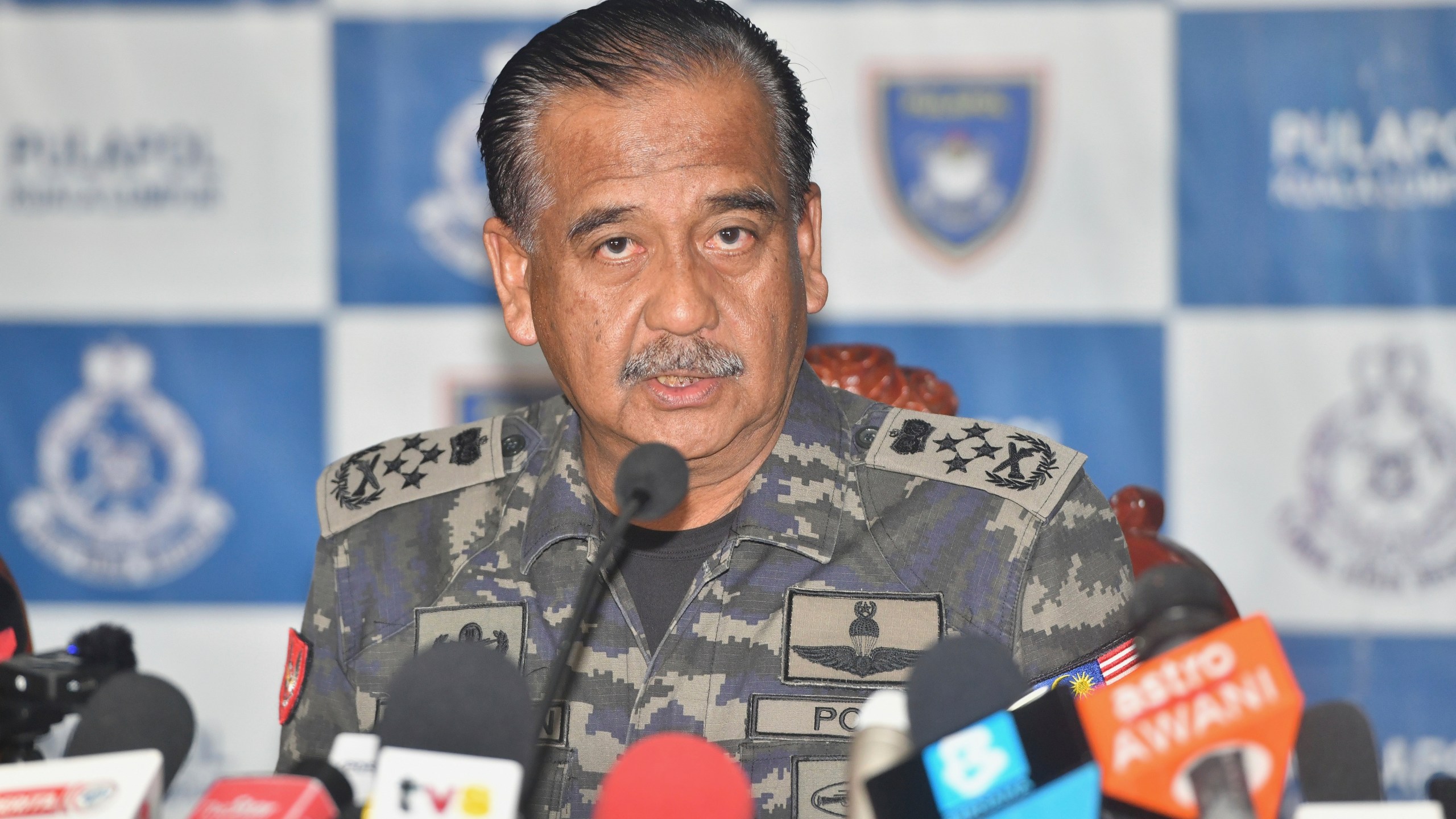 Malaysia Inspectors-General of Police Razarudin Husain speaks during a press conference in Kuala Lumpur, Monday, Sept. 23, 2024. (AP Photo)