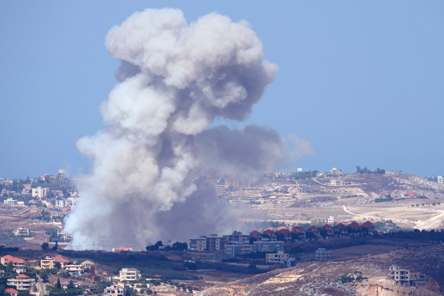 Smoke rises from Israeli airstrikes on villages in the Nabatiyeh district, seen from the southern town of Marjayoun, Lebanon, Monday, Sept. 23, 2024.(AP Photo/Hussein Malla)