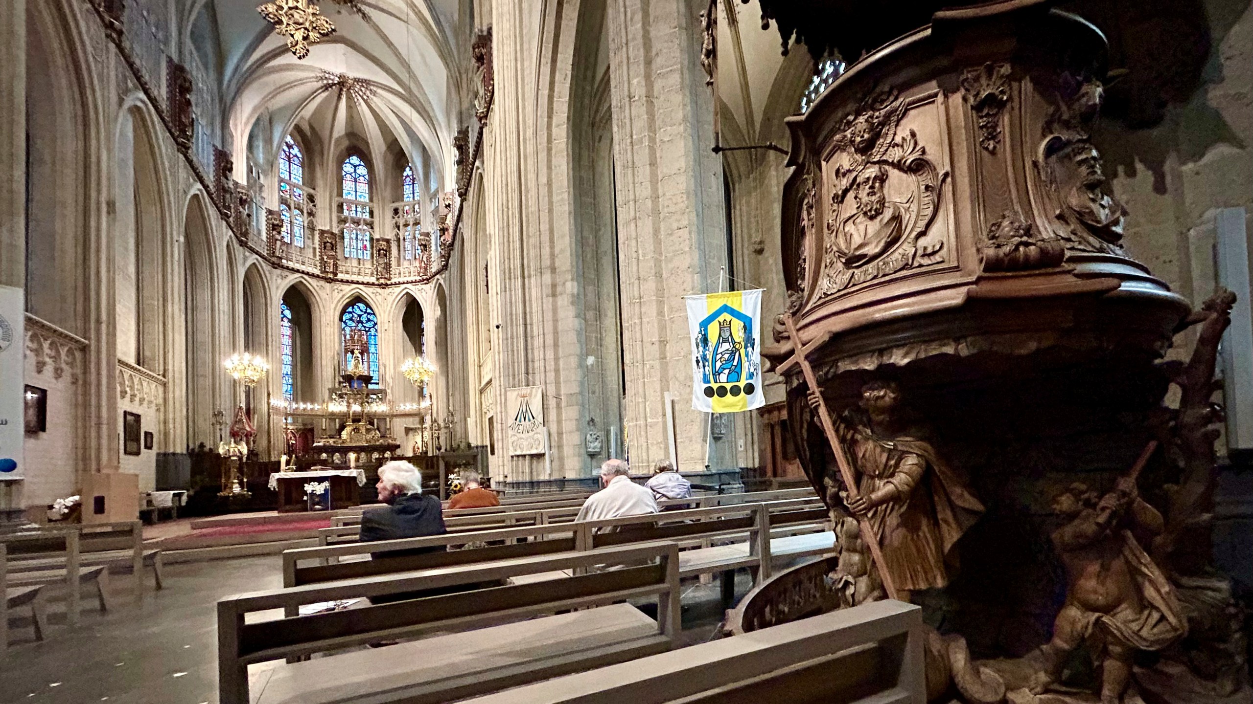 Parishioners wait for the start of a service at St. Martin's Basilica, in Halle, Belgium, Friday, Sept. 6, 2024. (AP Photo/Raf Casert)