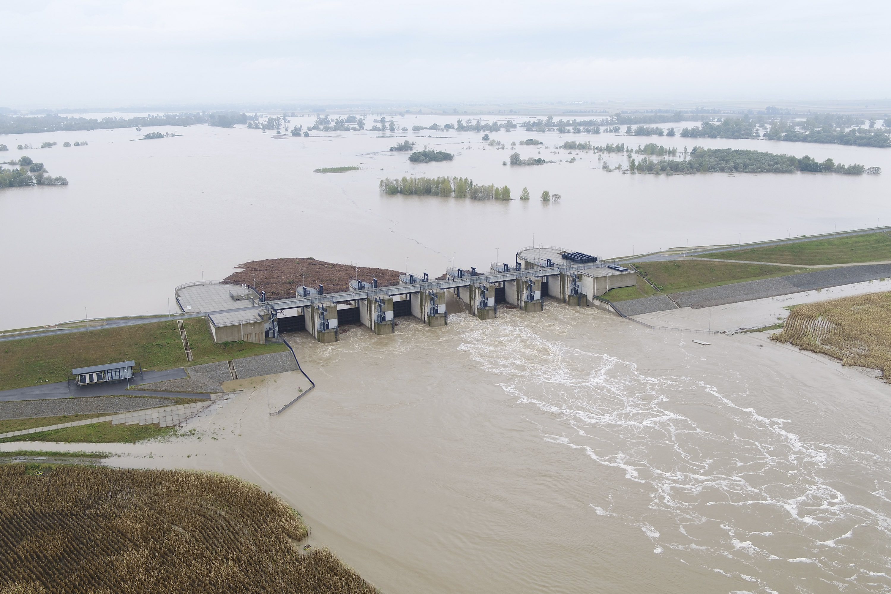 This photo provided by the state company Polish Waters shows the Oder River flood waters channelled into and contained by the newly-built Lower Raciborz Reservoir that has spared the cities of Opole and Wroclaw from flooding, in Raciborz, southwestern Poland, Sept. 16, 2024. (Polish Waters via AP)