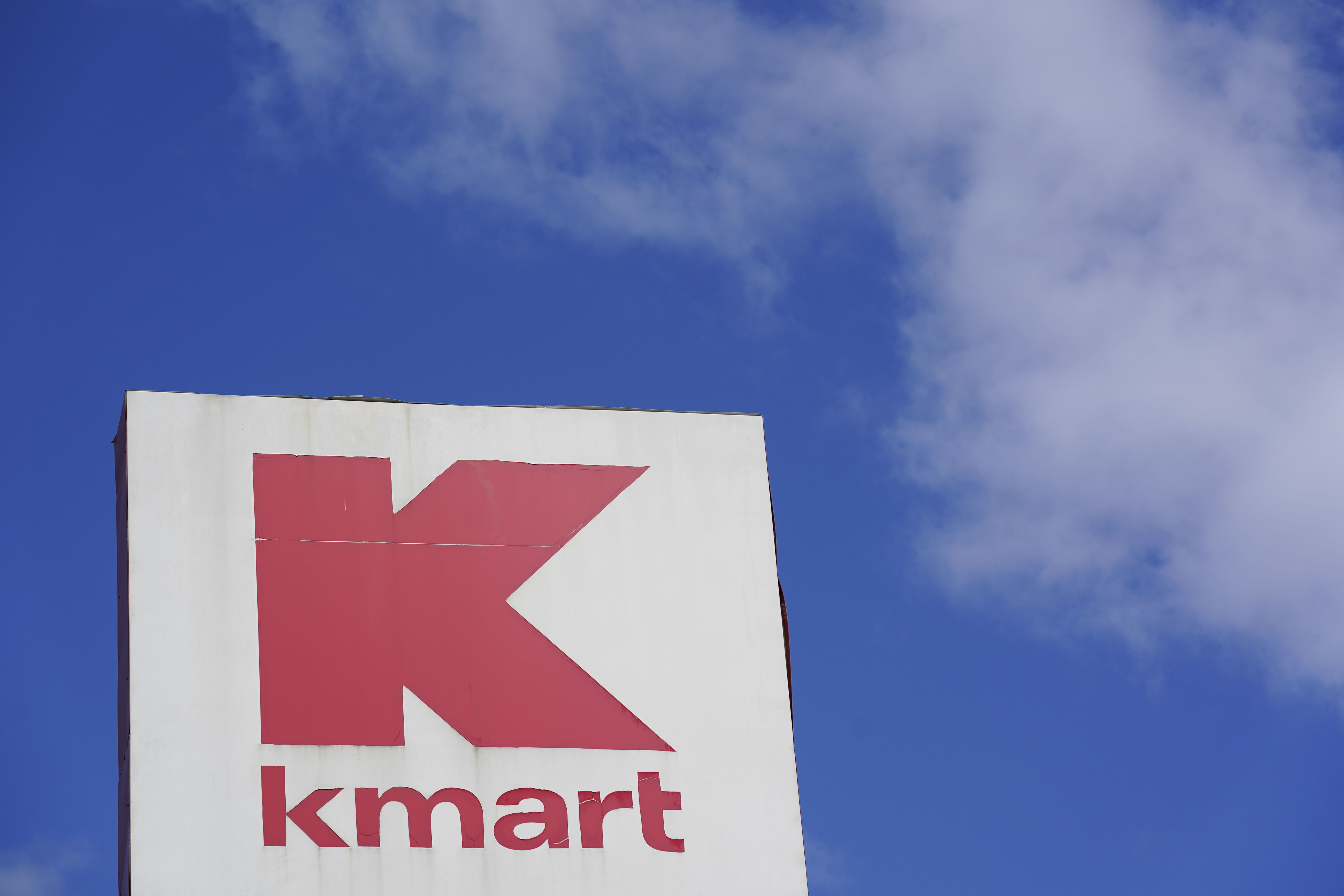 FILE - A large Kmart sign is displayed in front of a shopping plaza in Avenel, N.J., April 4, 2022. (AP Photo/Seth Wenig, File)