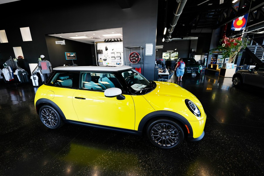 FILE - A 2025 Cooper S hardtop sits on display in the showroom of a Mini dealership Sept. 4, 2024, in Highlands Ranch, Colo. (AP Photo/David Zalubowski, File)