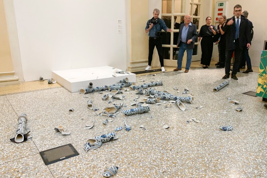 This photo released by OperaLaboratori Tuesday, Sept. 24, 2024 shows the artwork Porcelain Cube by artist Ai Wei Wei destroyed by a Czech man on the day of the opening of the exhibition 'Ai Weiwei, Who am I?", at Palazzo Fava, in Bologna, Italy, Friday, Sept. 20, 2024. (OperaLaboratori via AP)