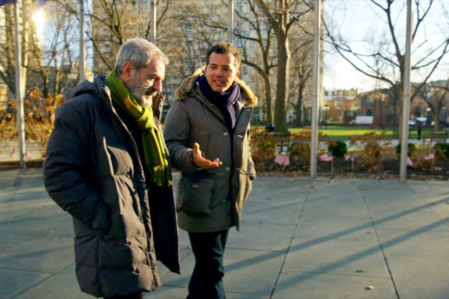 This image released by PBS shows actor/host John Leguizamo, right, with Barnard College professor José Moya in New York during the filming of the series "VOCES American Historia: The Untold History of Latinos." (NGL Studios/PBS via AP)