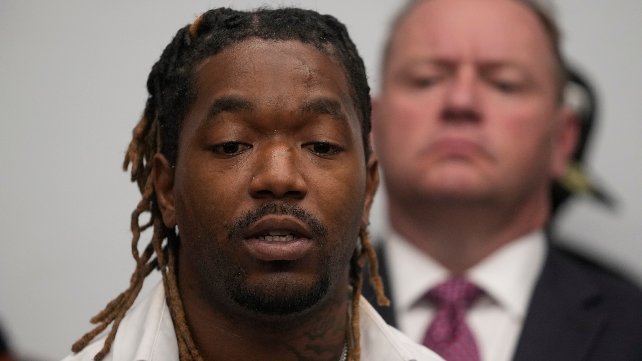 Michael Moss, 37, a victim, speaks during a press conference regarding a lawsuit alleging that more than 200 men and women were sexually abused as children while in custody at juvenile detention centers in Illinois, Tuesday, Sept. 24, 2024, in Chicago. (AP Photo/Erin Hooley)