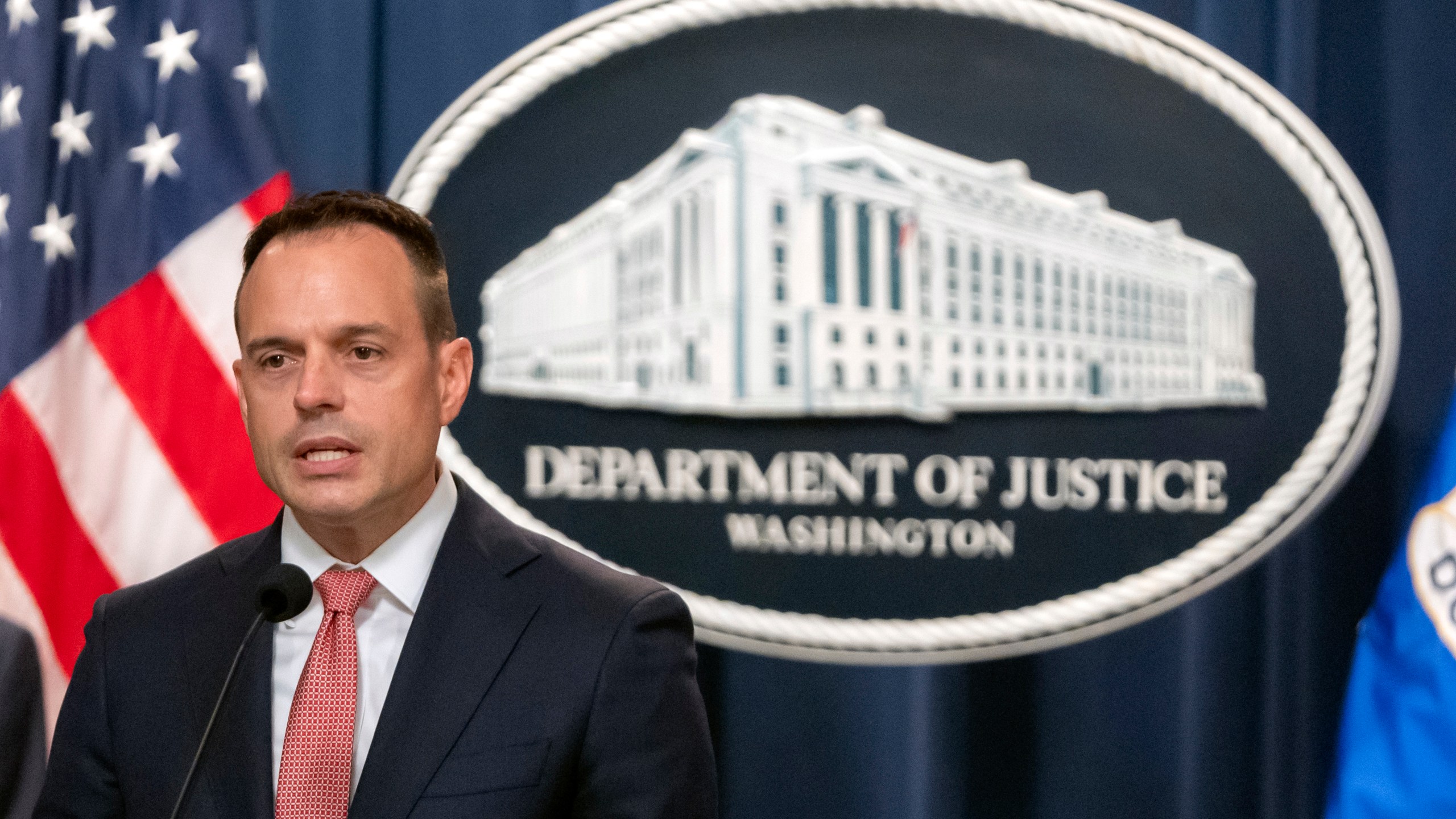 Principal Deputy Associate Attorney General Benjamin Mizer speaks during a news conference at the Department of Justice, Tuesday, Sept. 24, 2024, in Washington. (AP Photo/Mark Schiefelbein)