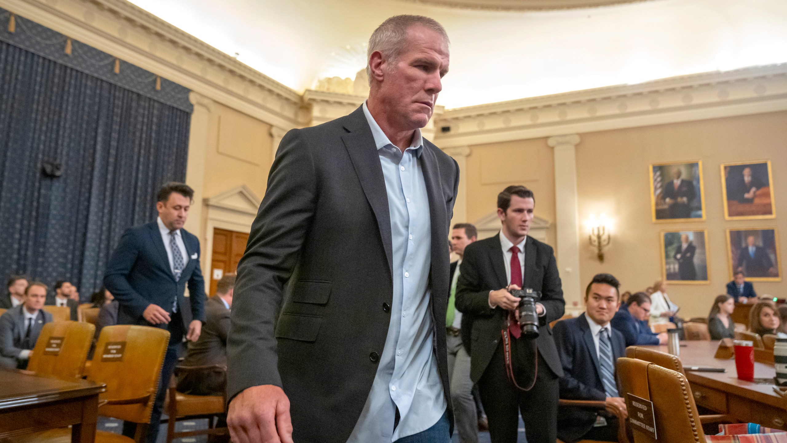 Former NFL quarterback Brett Favre arrives to appear before the House Committee on Ways and Means on Capitol Hill, Tuesday, Sept. 24, 2024, in Washington. (AP Photo/Mark Schiefelbein)