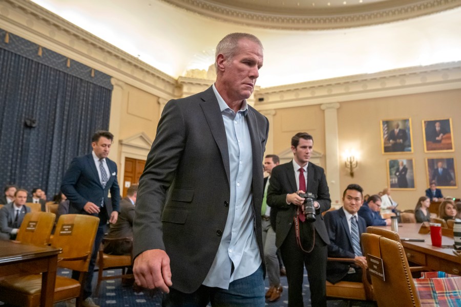 Former NFL quarterback Brett Favre arrives to appear before the House Committee on Ways and Means on Capitol Hill, Tuesday, Sept. 24, 2024, in Washington. (AP Photo/Mark Schiefelbein)