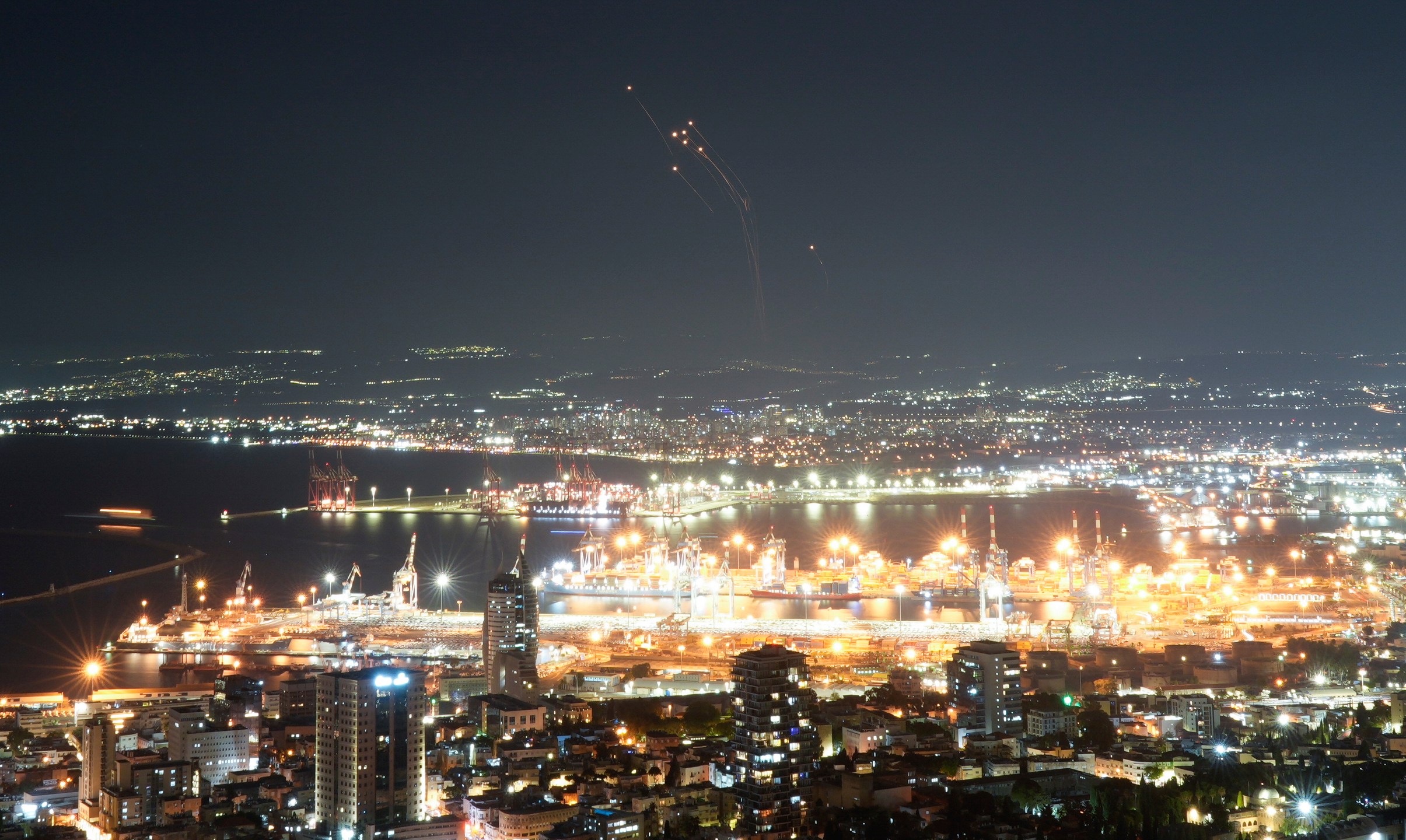 Israeli Iron Dome air defense system fires to intercept rockets that were launched from Lebanon, in northern Israel, Tuesday, Sept. 24, 2024. (AP Photo/Ohad Zwigenberg)