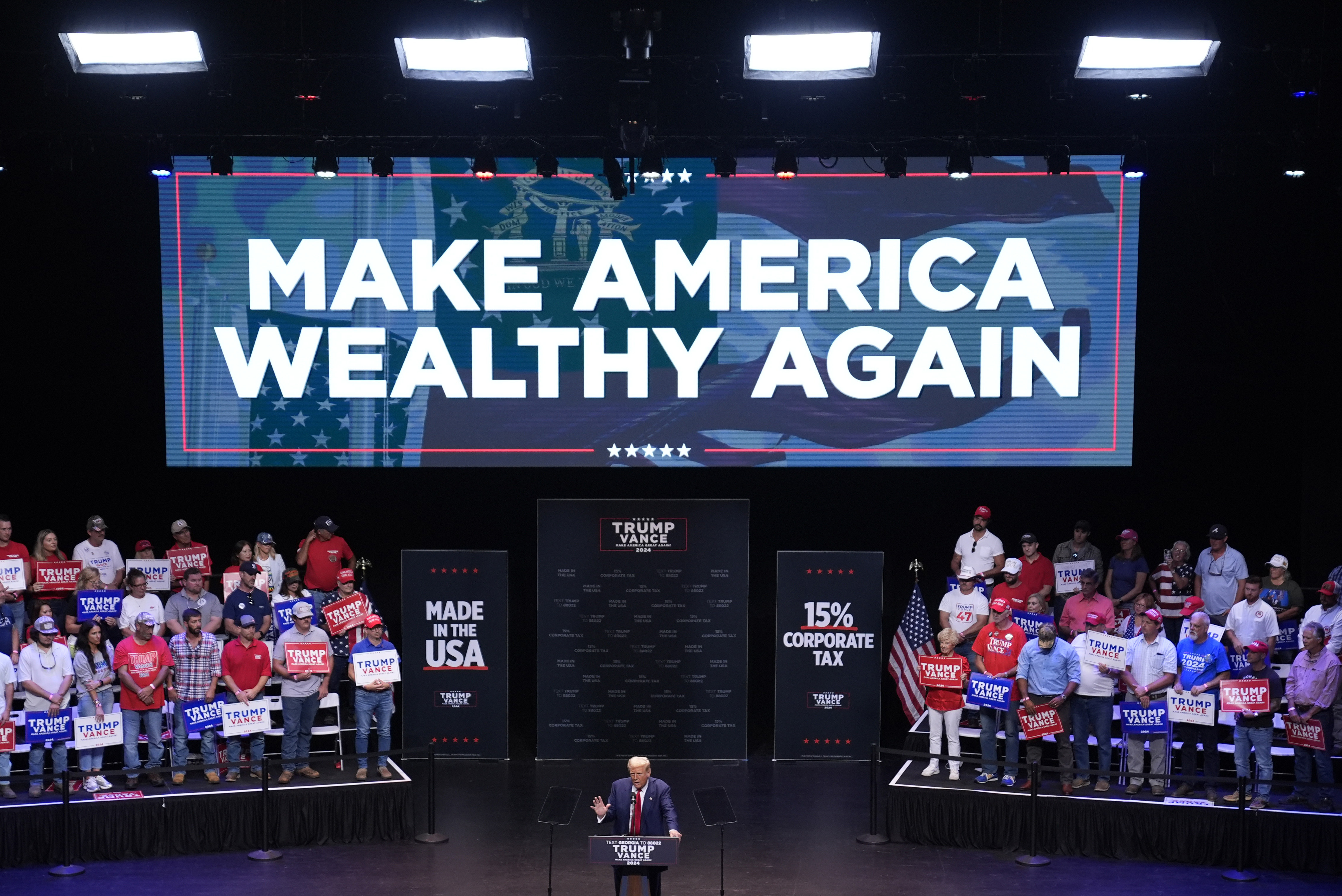 Republican presidential nominee former President Donald Trump speaks about the tax code and manufacturing at the Johnny Mercer Theatre Civic Center, Tuesday, Sept. 24, 2024, in Savannah, Ga. (AP Photo/Evan Vucci)